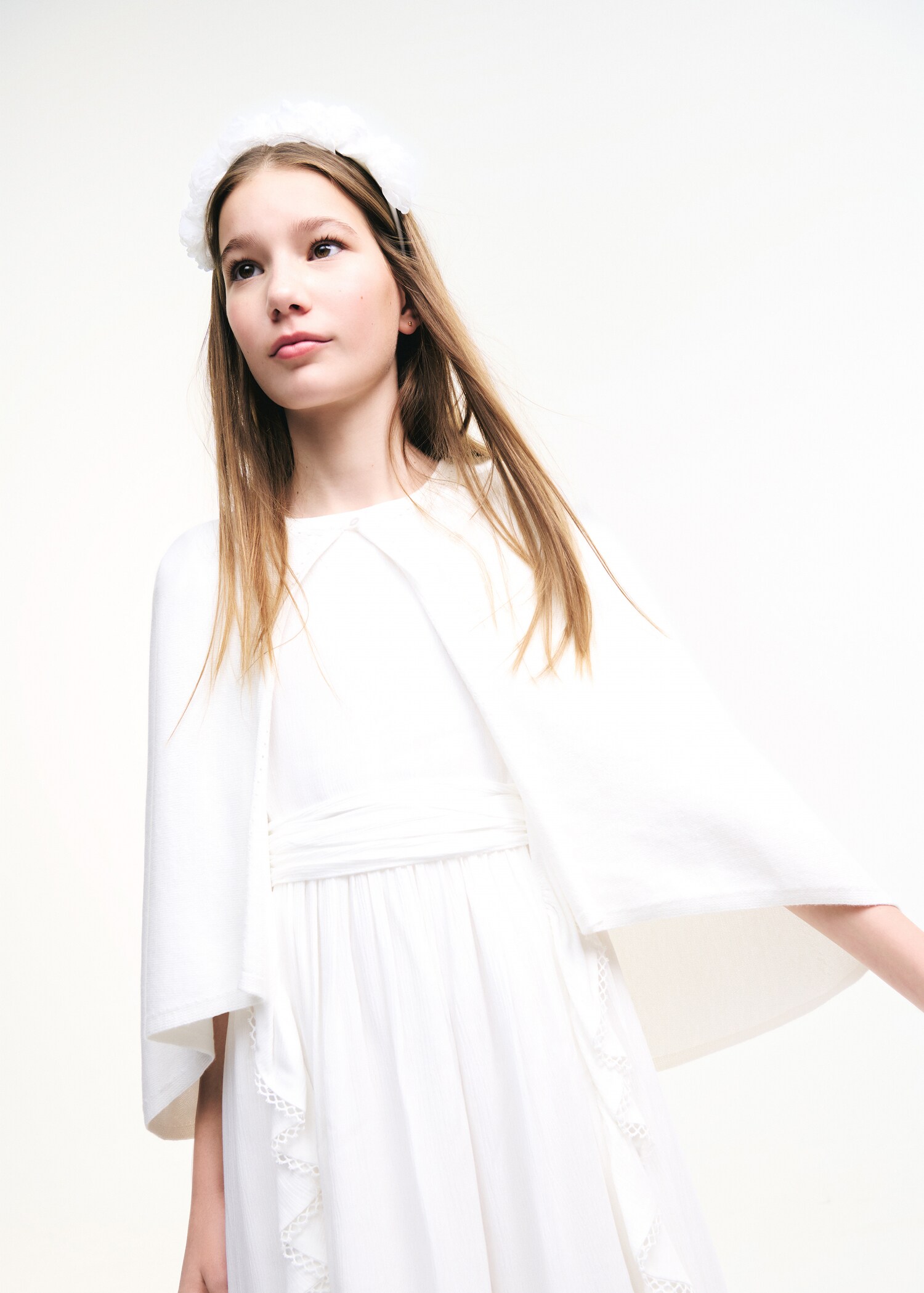 Stickad cape med genombrutna detaljer - Detaljer om artikeln 6