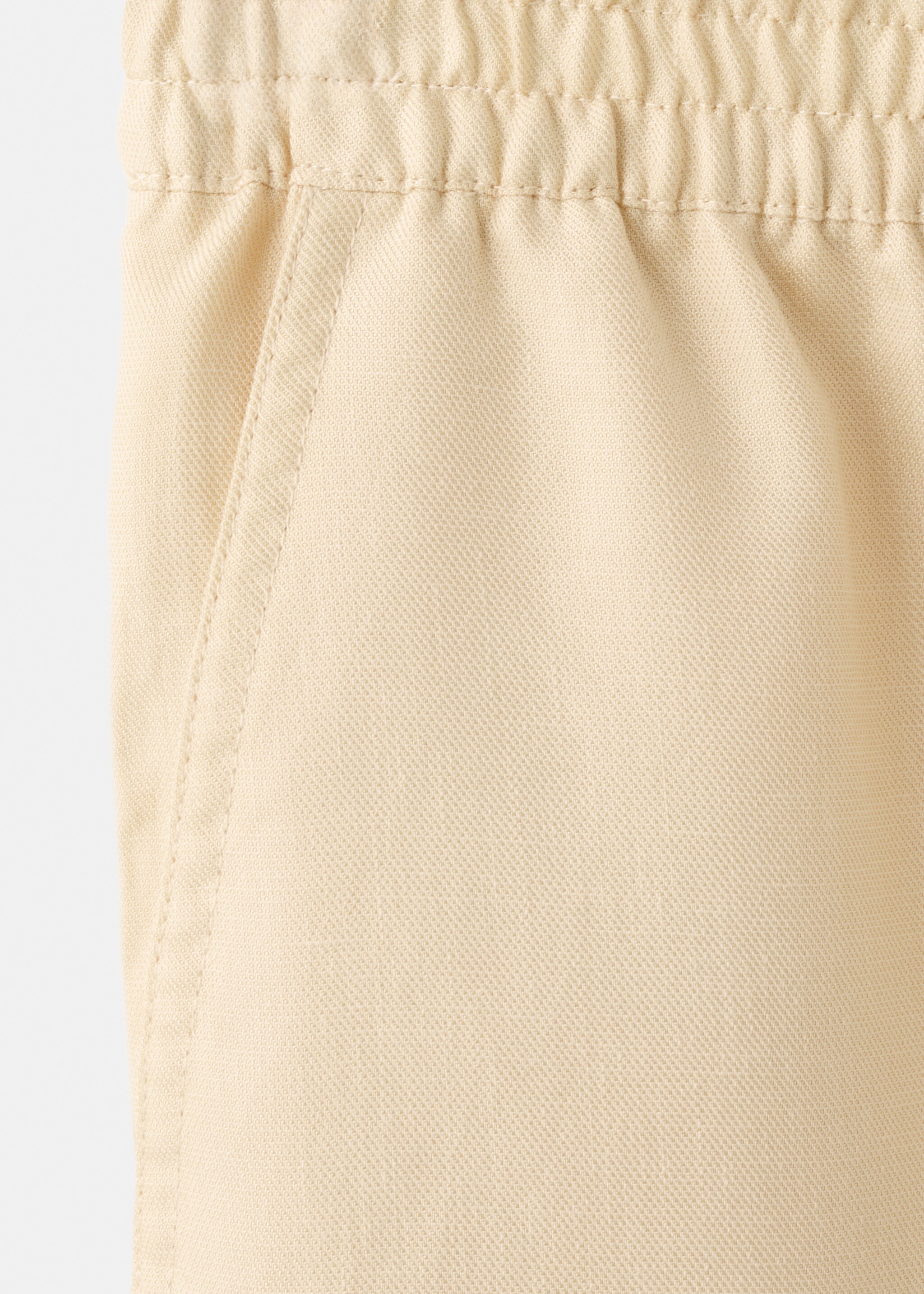 Balloon trousers with elastic waist - Details of the article 8, Ecru. Ref: 27025961-00.