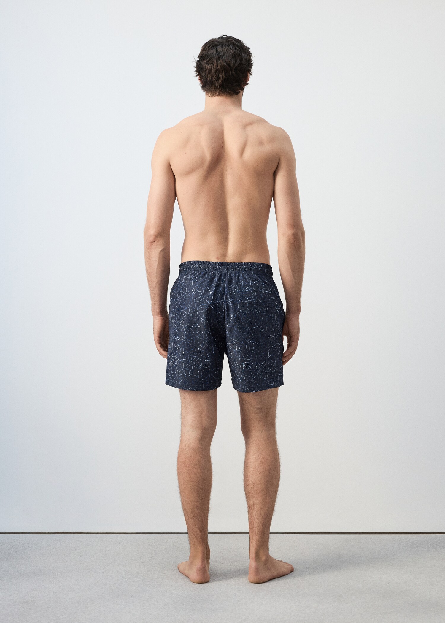 Swimming trunks flower - Reverse of the article