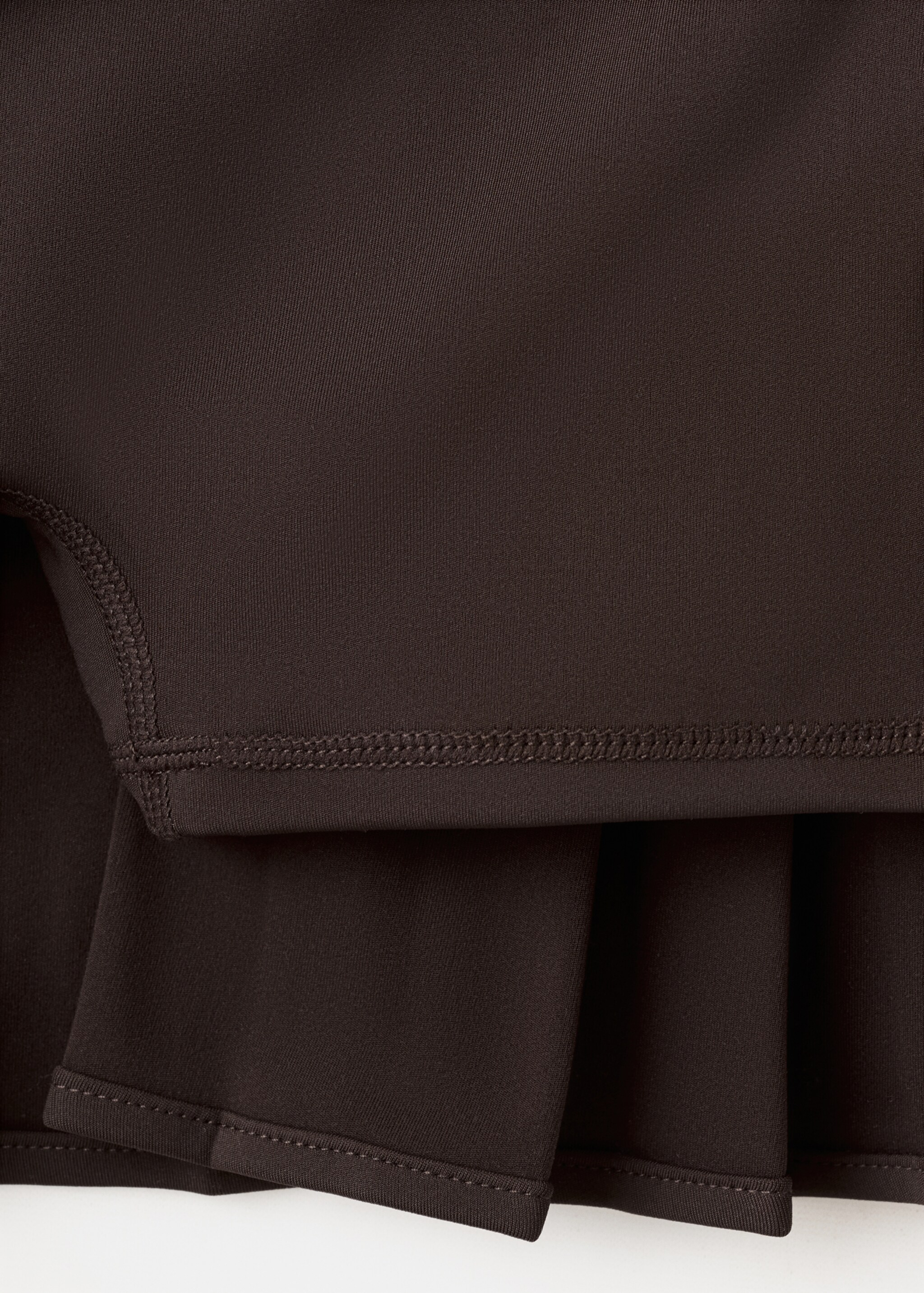 Pleated skirt with printed logo - Details of the article 0, Brown. Ref: 27027165-00.