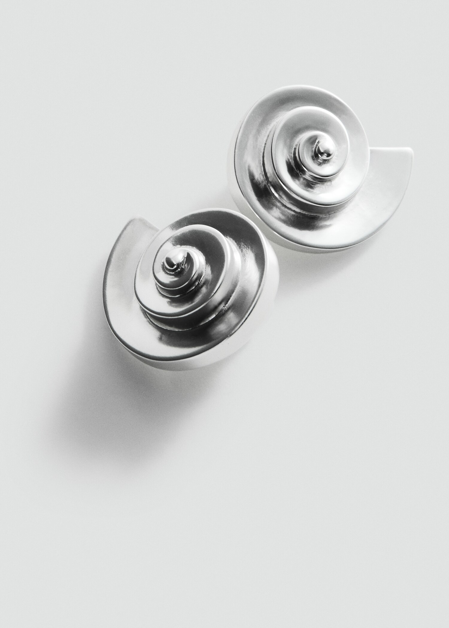 أقراط من الصدف - رؤية وسط