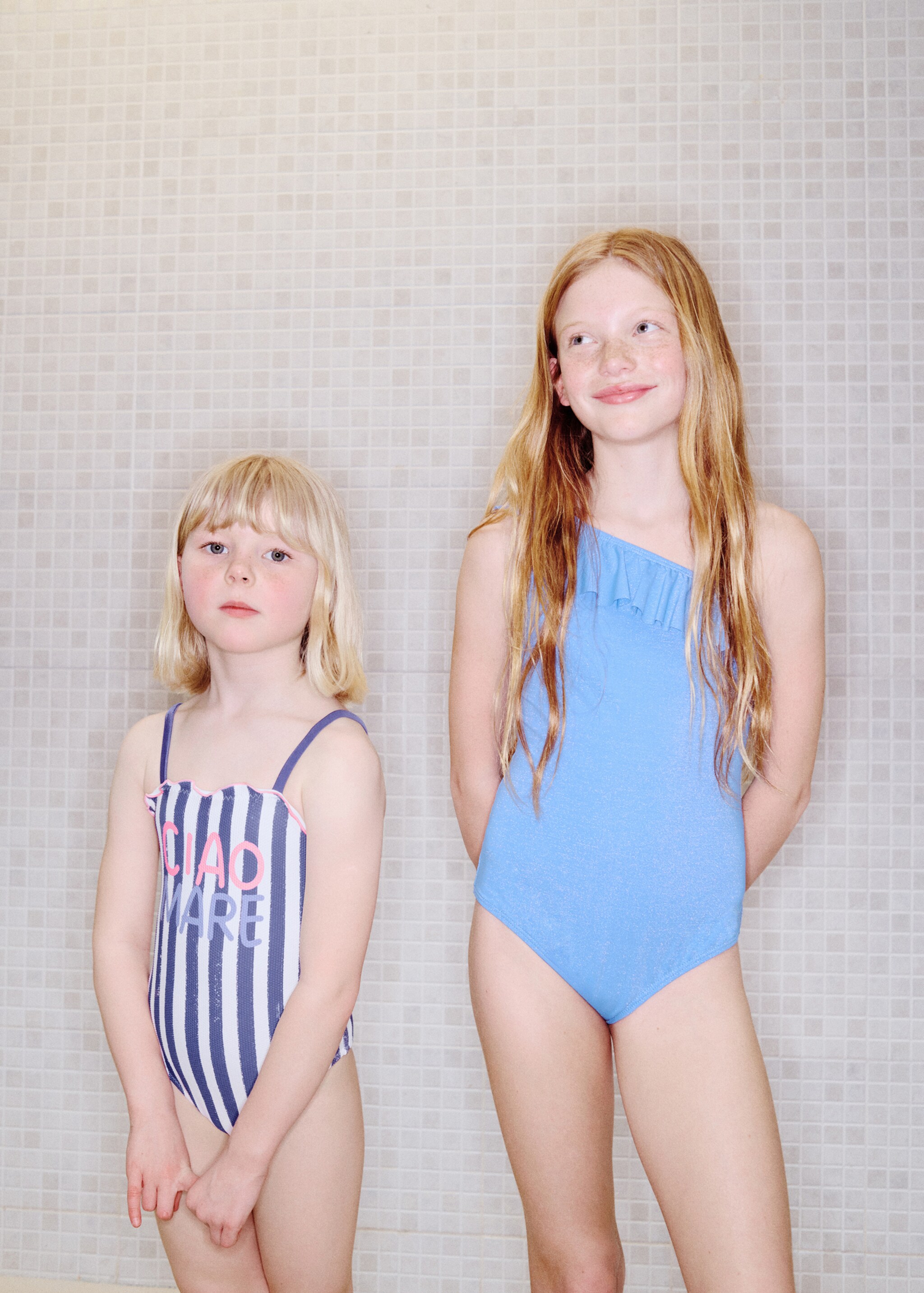 Striped swimsuit with text print - Details of the article 5, Navy. Ref: 27027896-00.