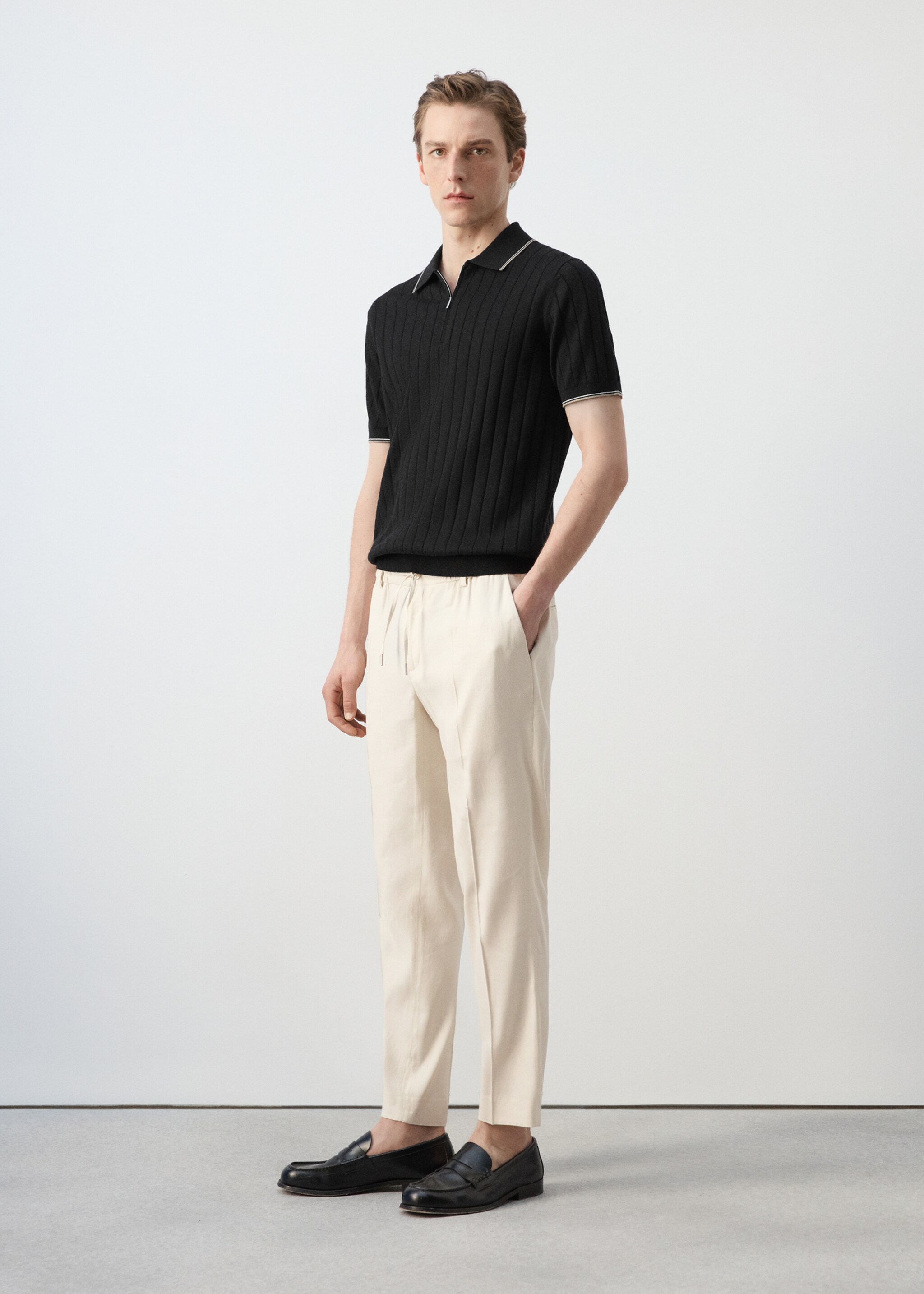 Fine-knit polo shirt with zip - Details of the article 2, Black. Ref: 27027916-00.