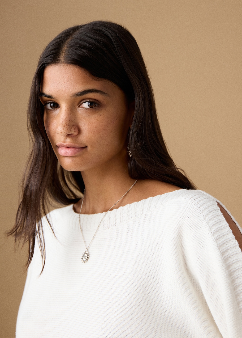 Knitted sweater with cut-out