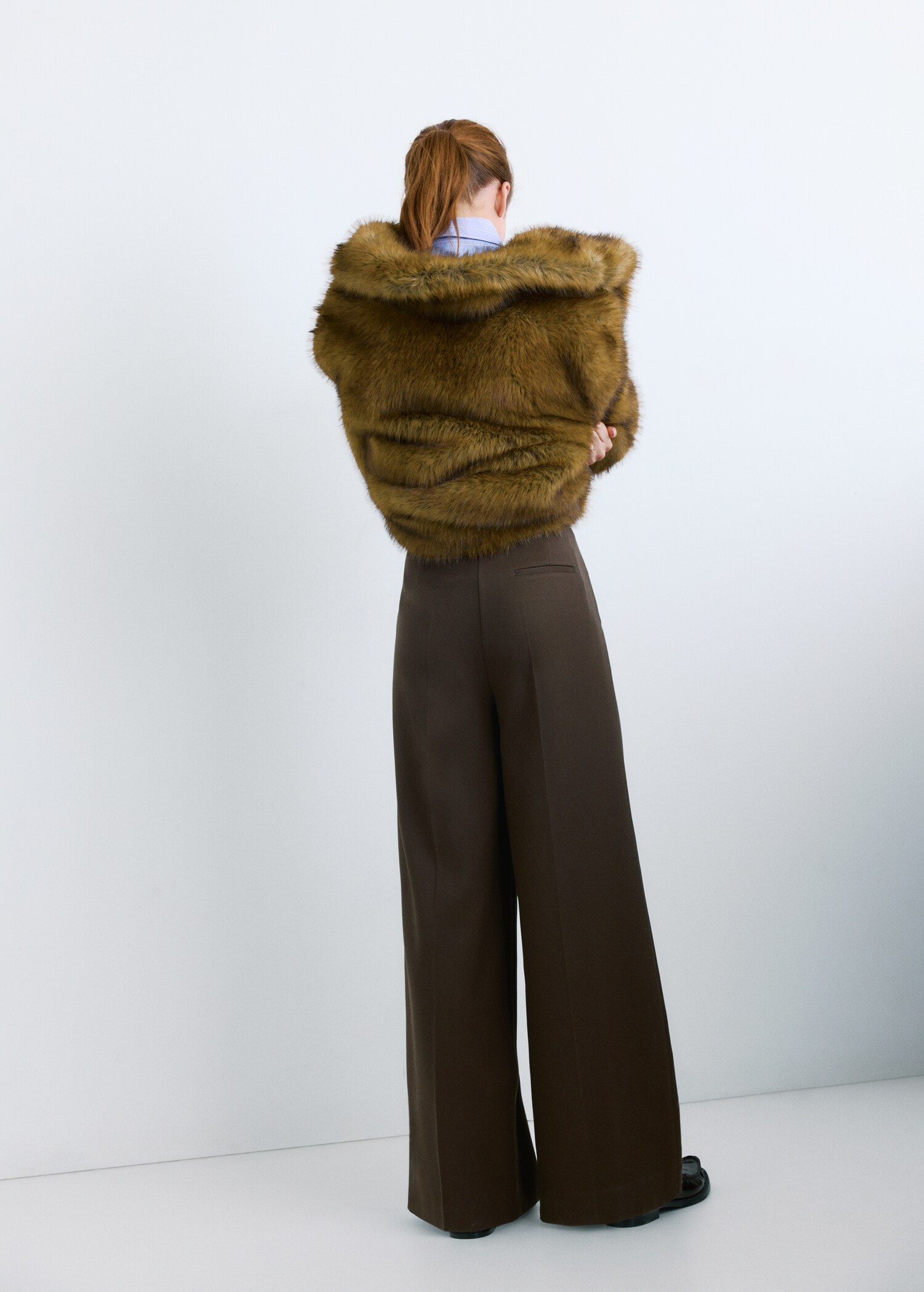 Wide-leg mid-rise pleated trousers - Reverse of the article