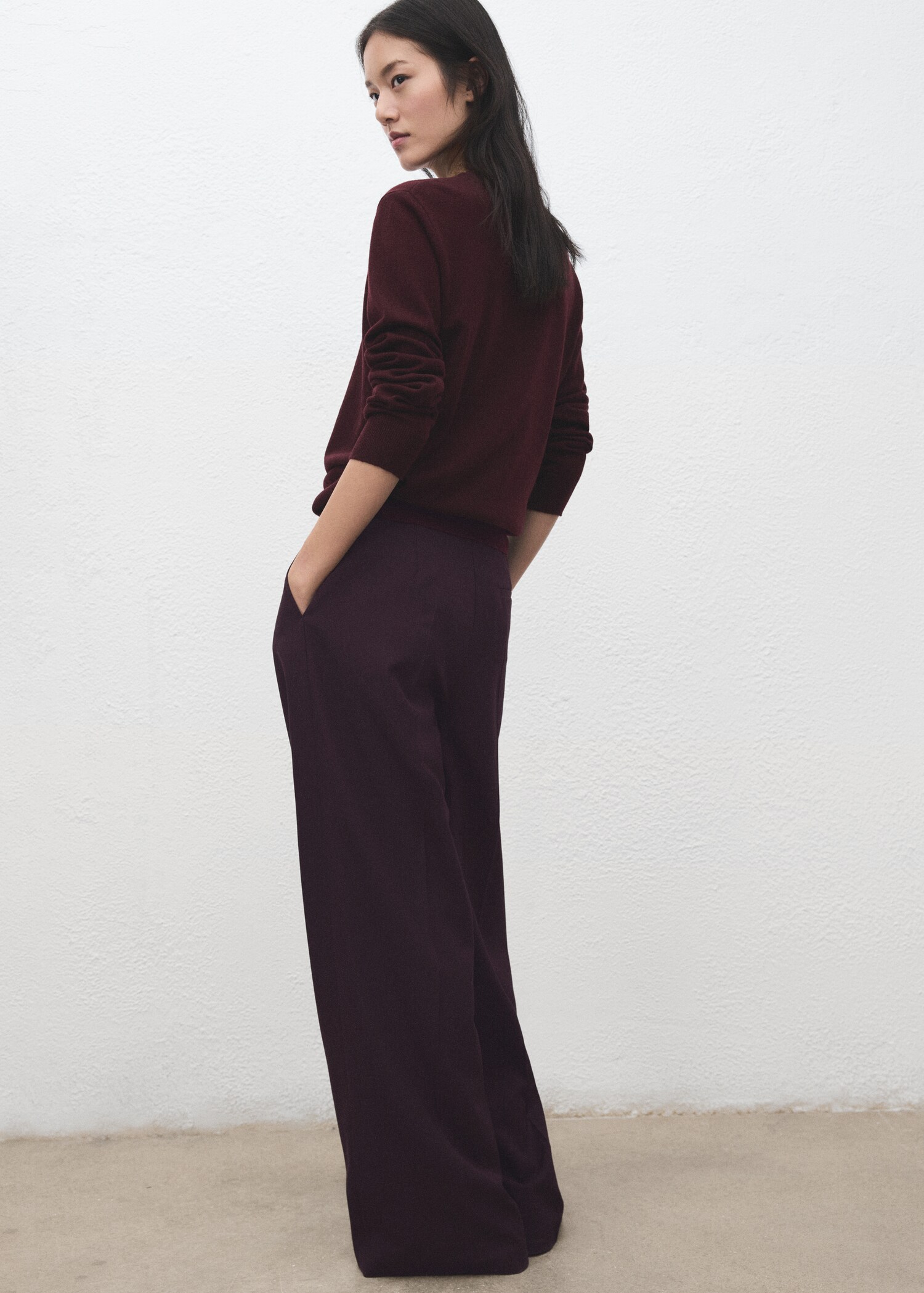 Wide-leg mid-rise pleated trousers - Reverse of the article