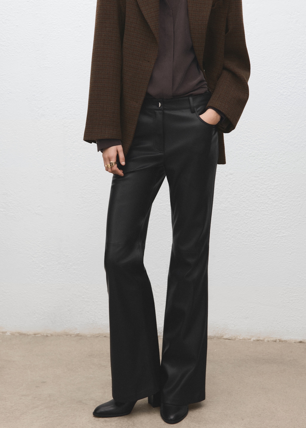Faux-leather flared trousers