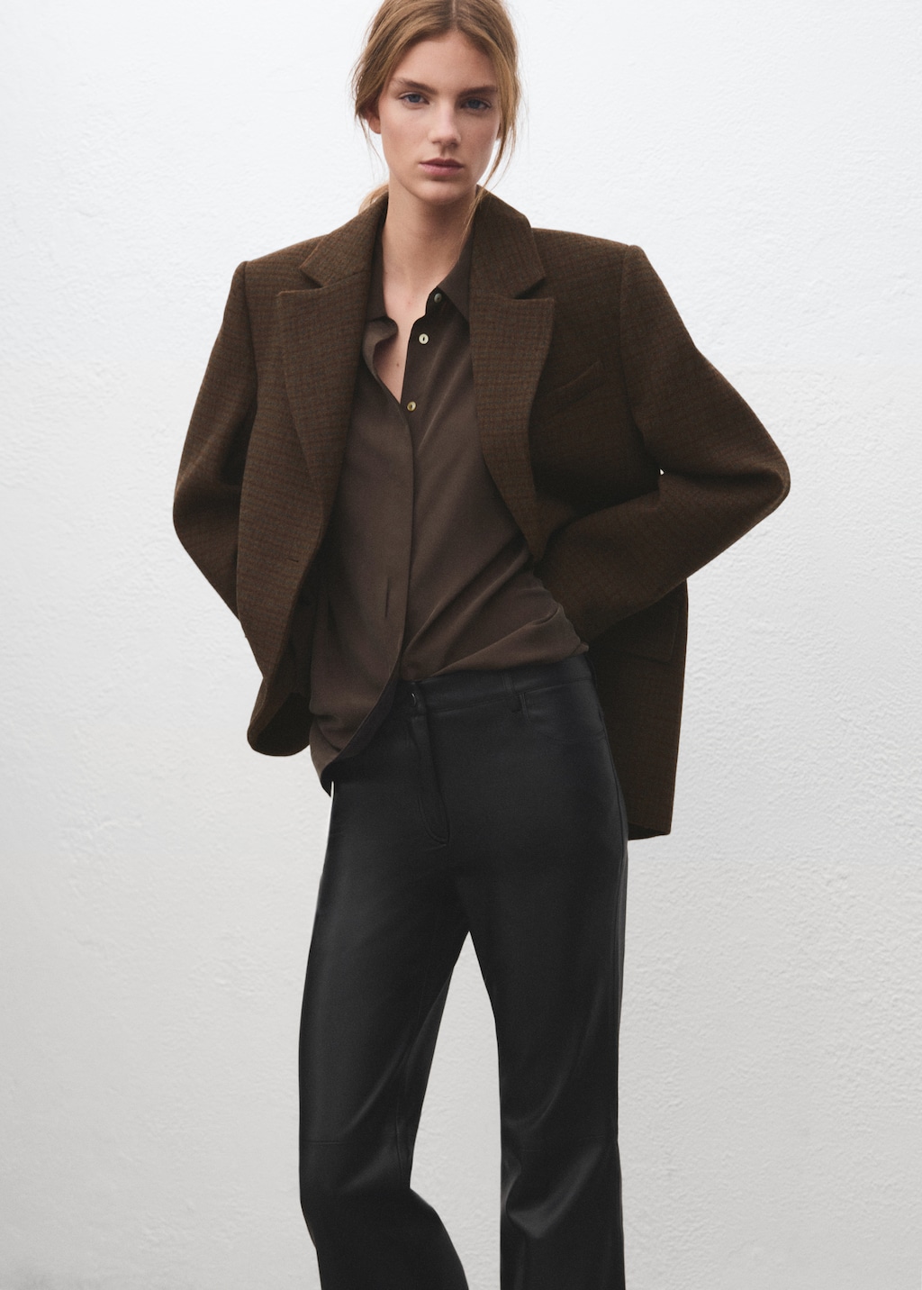 Faux-leather flared trousers