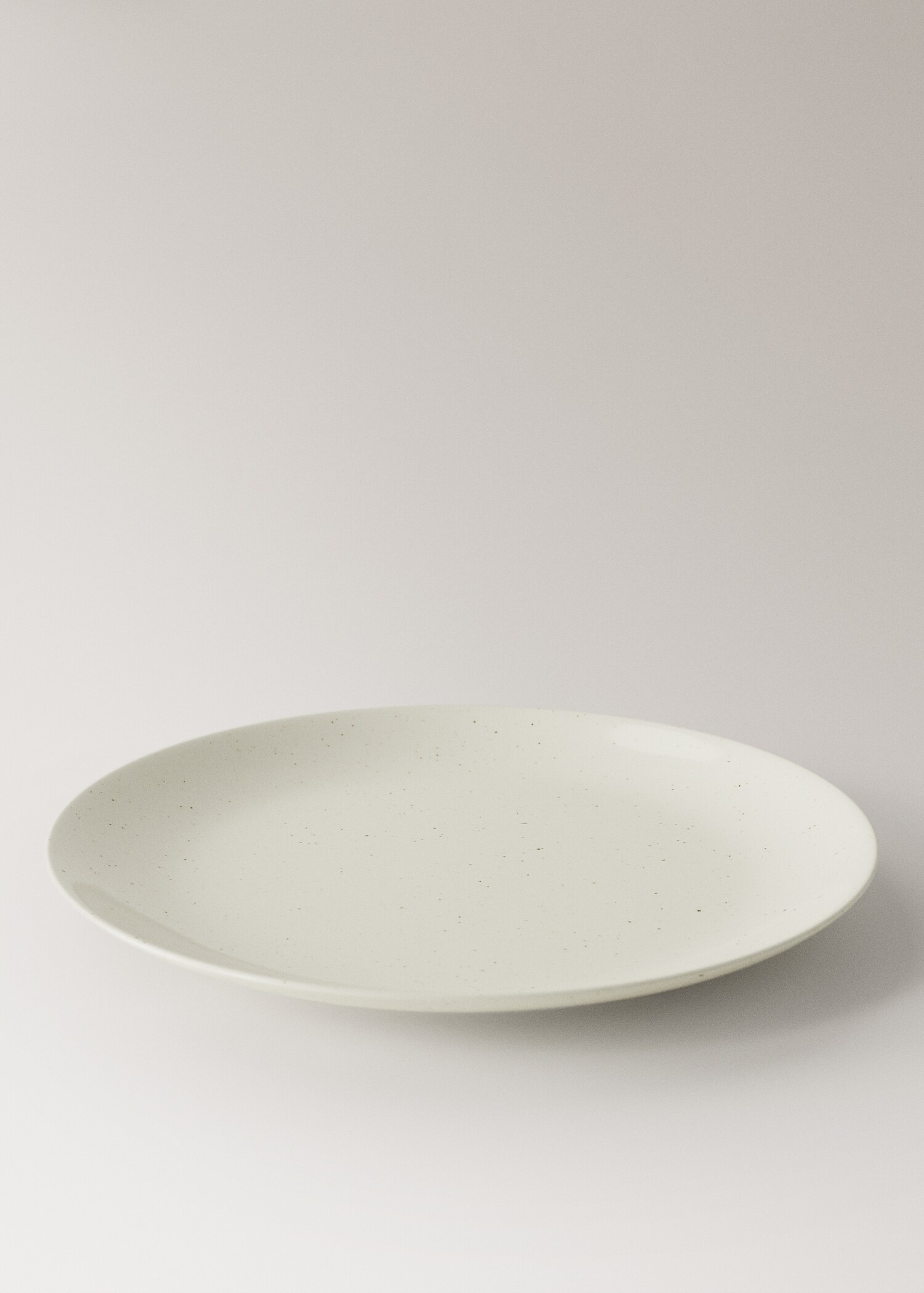 Stoneware dinner plate with spots - Details of the article 1