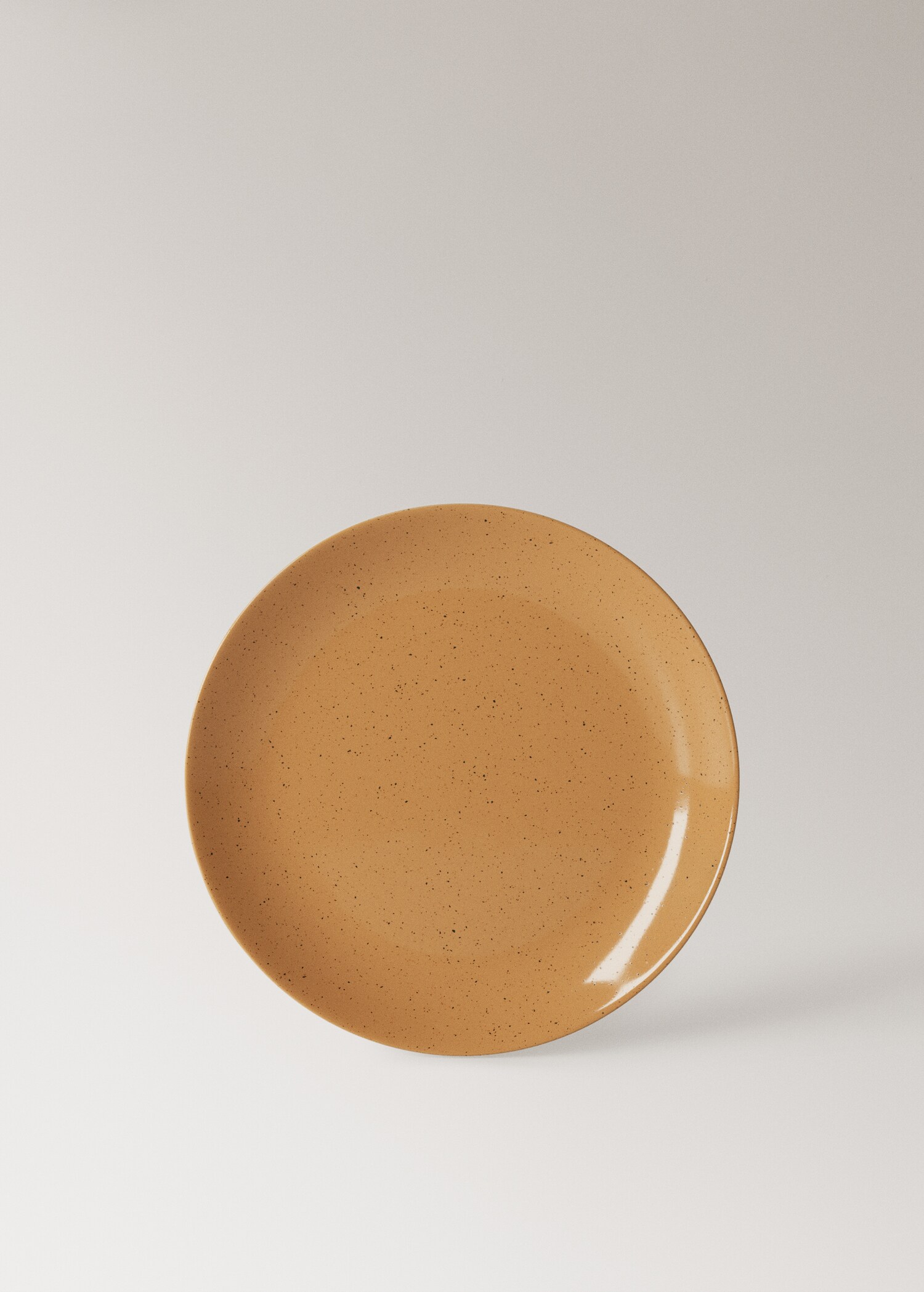 Stoneware dinner plate with spots - Article without model