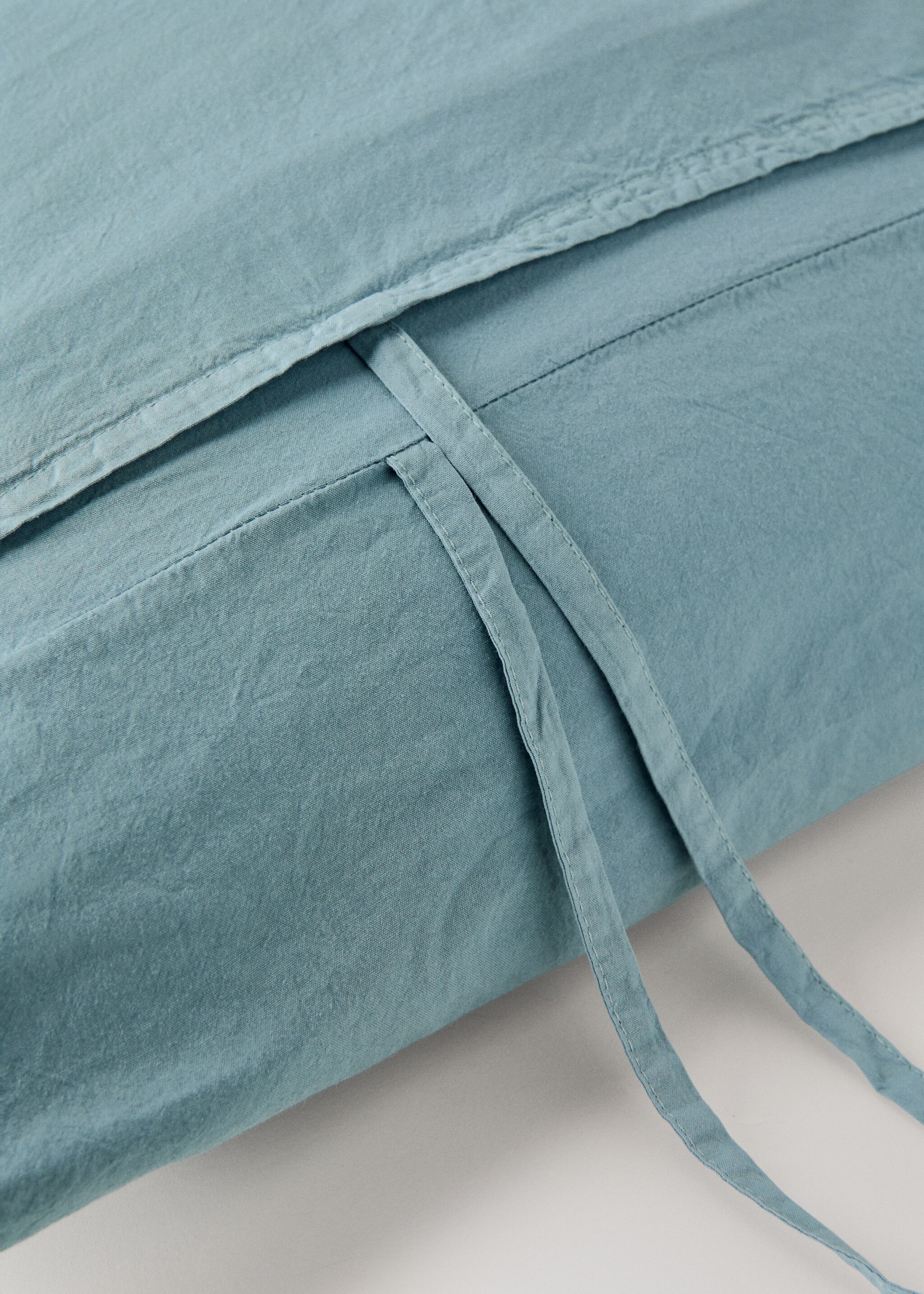Two cotton pillowcases with tie closures 50x75 cm - Details of the article 2, Aqua Green. Ref: 27032915-00.