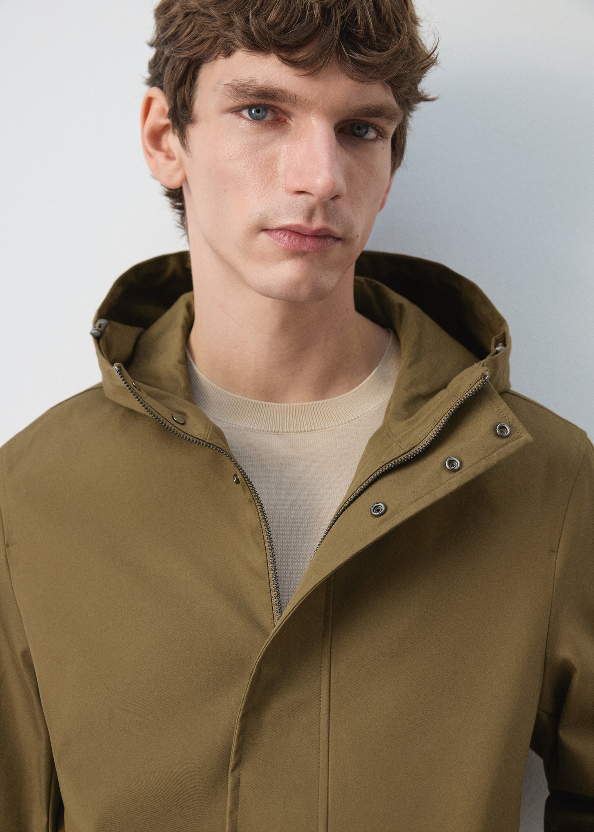 Water-repellent parka with pockets - Details of the article 1, Ochre. Ref: 27034410-00.