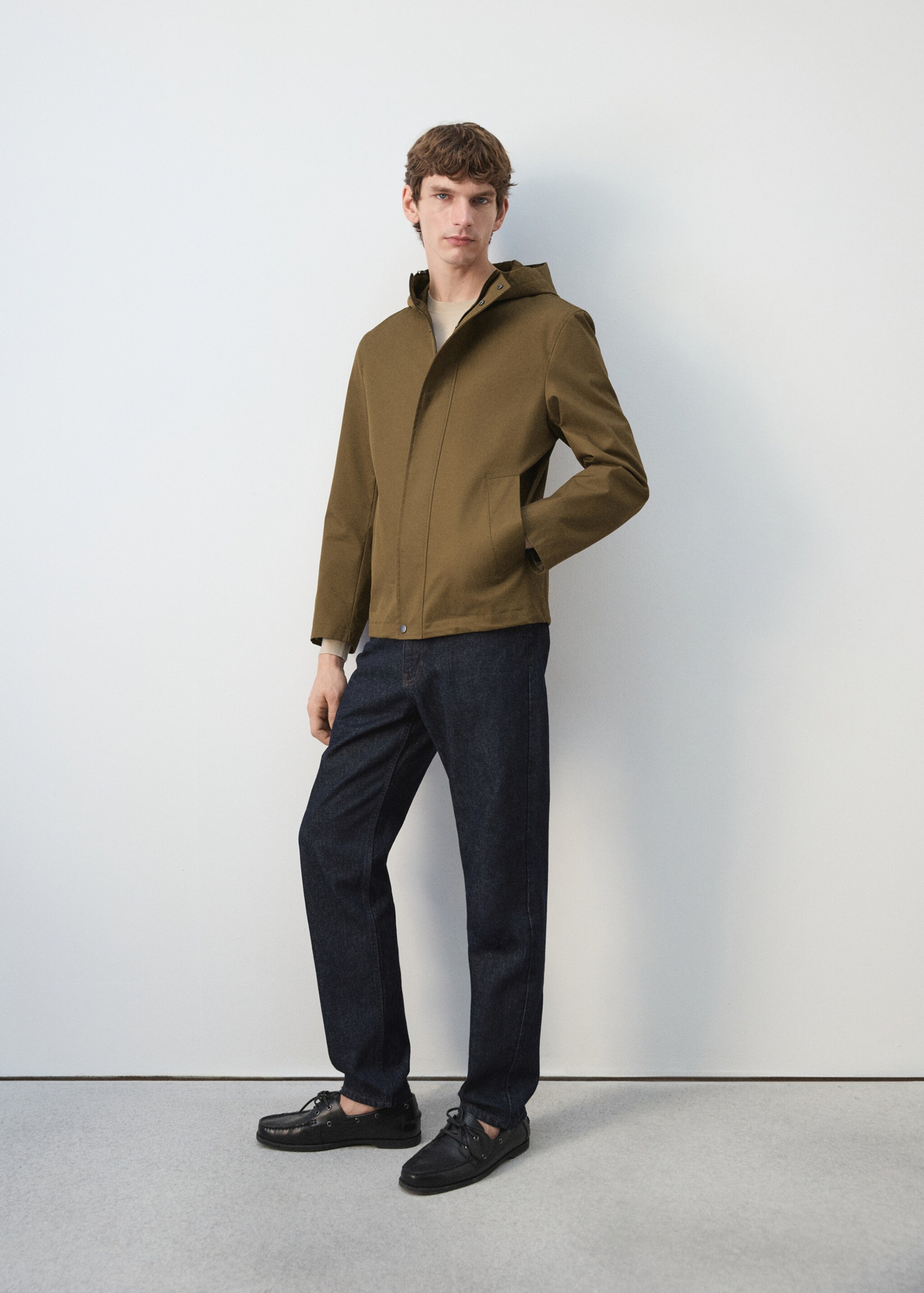 Water-repellent parka with pockets - Details of the article 6, Ochre. Ref: 27034410-00.