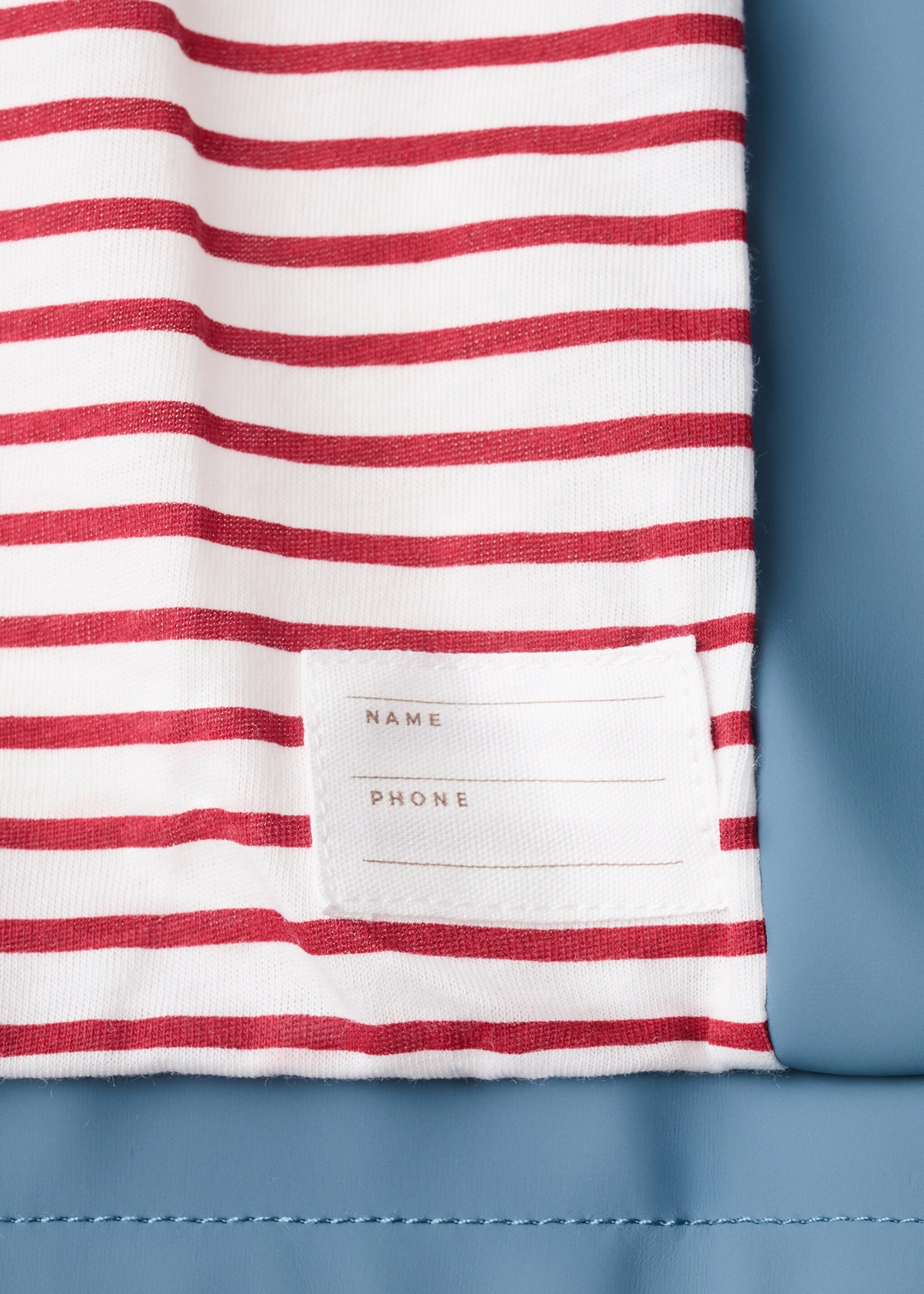 Rubberised parka with hood - Details of the article 0, China Blue. Ref: 27035148-00.