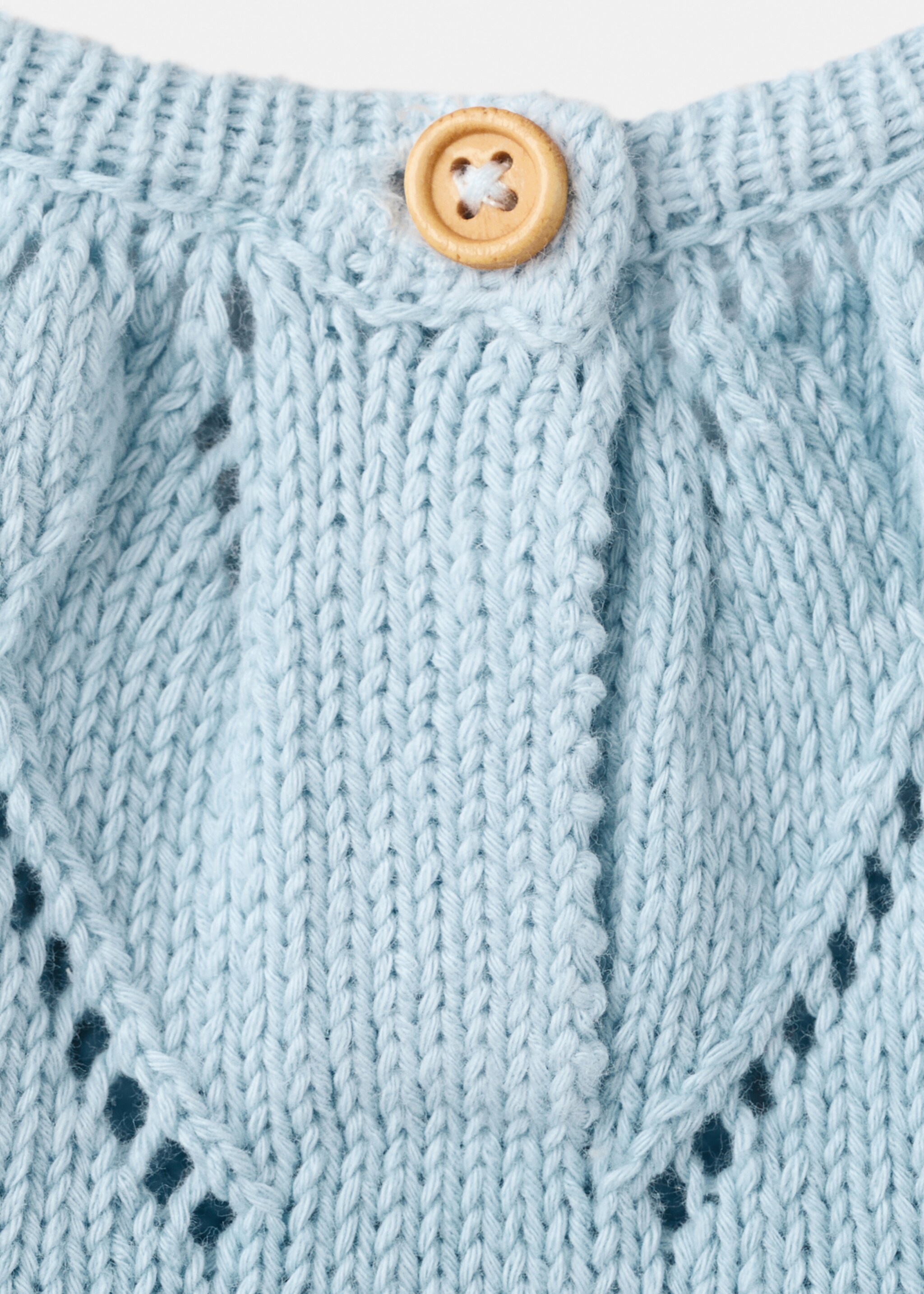 Knitted romper with lace details - Details of the article 8, Sky Blue. Ref: 27036723-00.