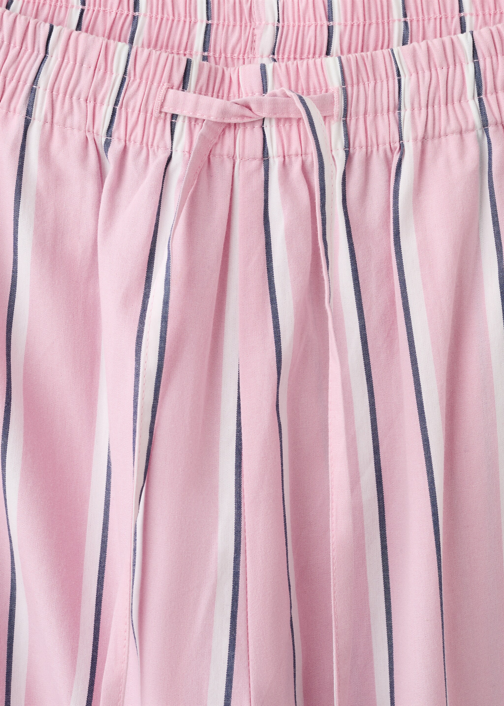 Striped trousers with scalloped details - Details of the article 8, Pastel Pink. Ref: 27036730-00.