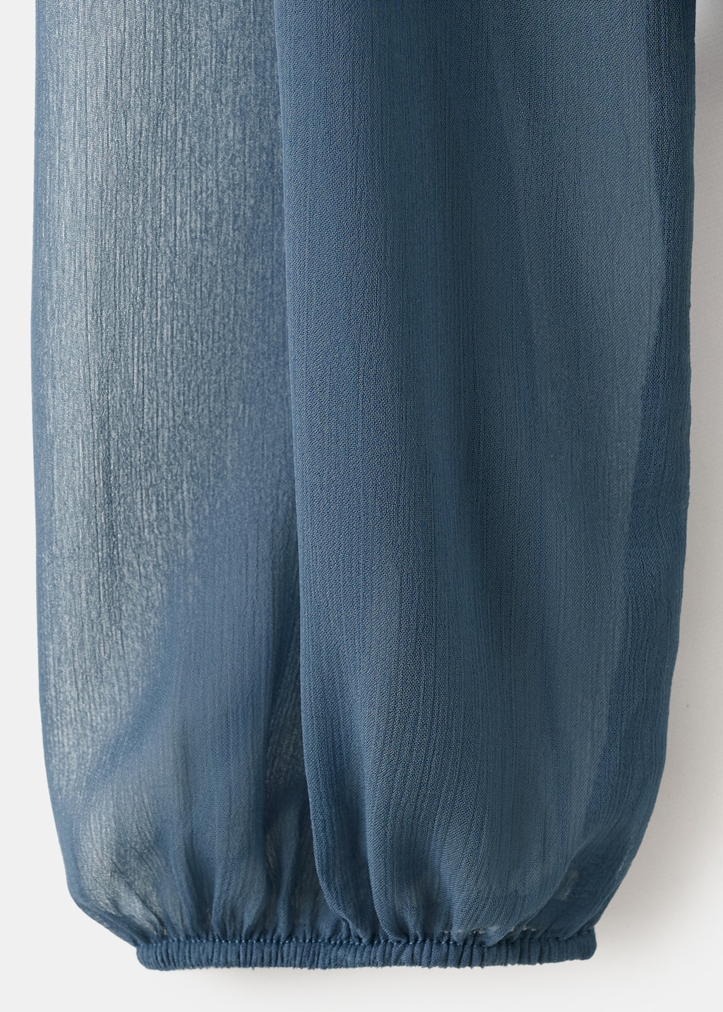 Sheer blouse with ruffles