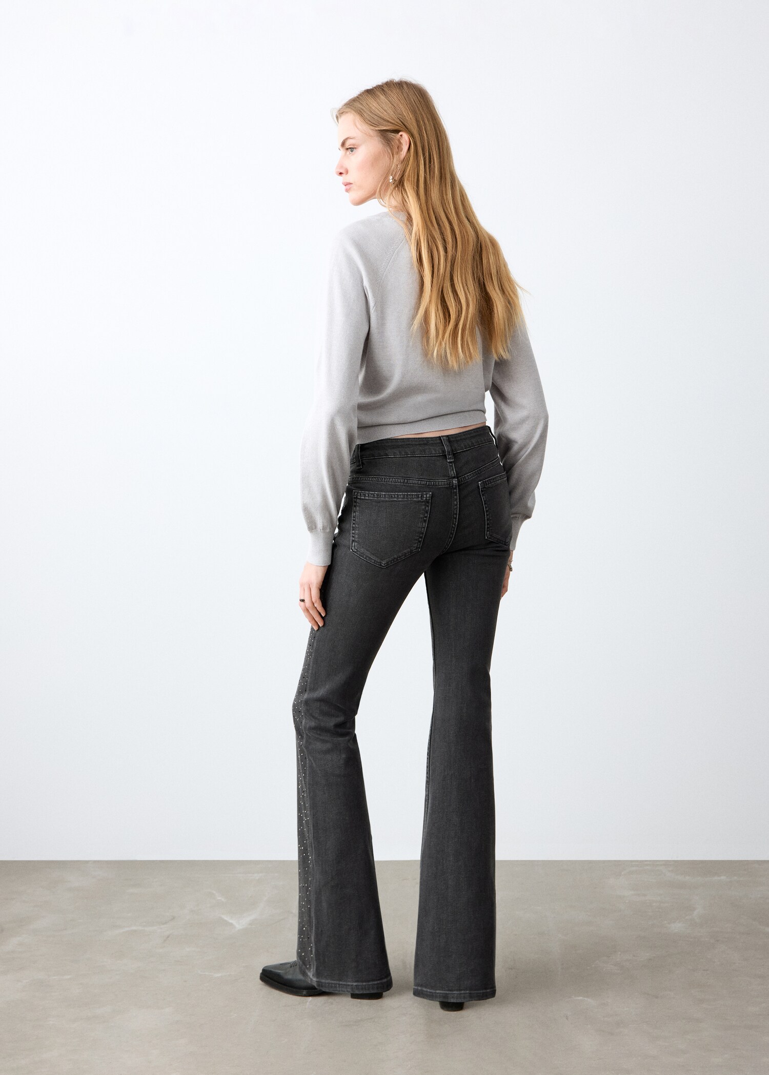 Rhinestone flare jeans - Reverse of the article