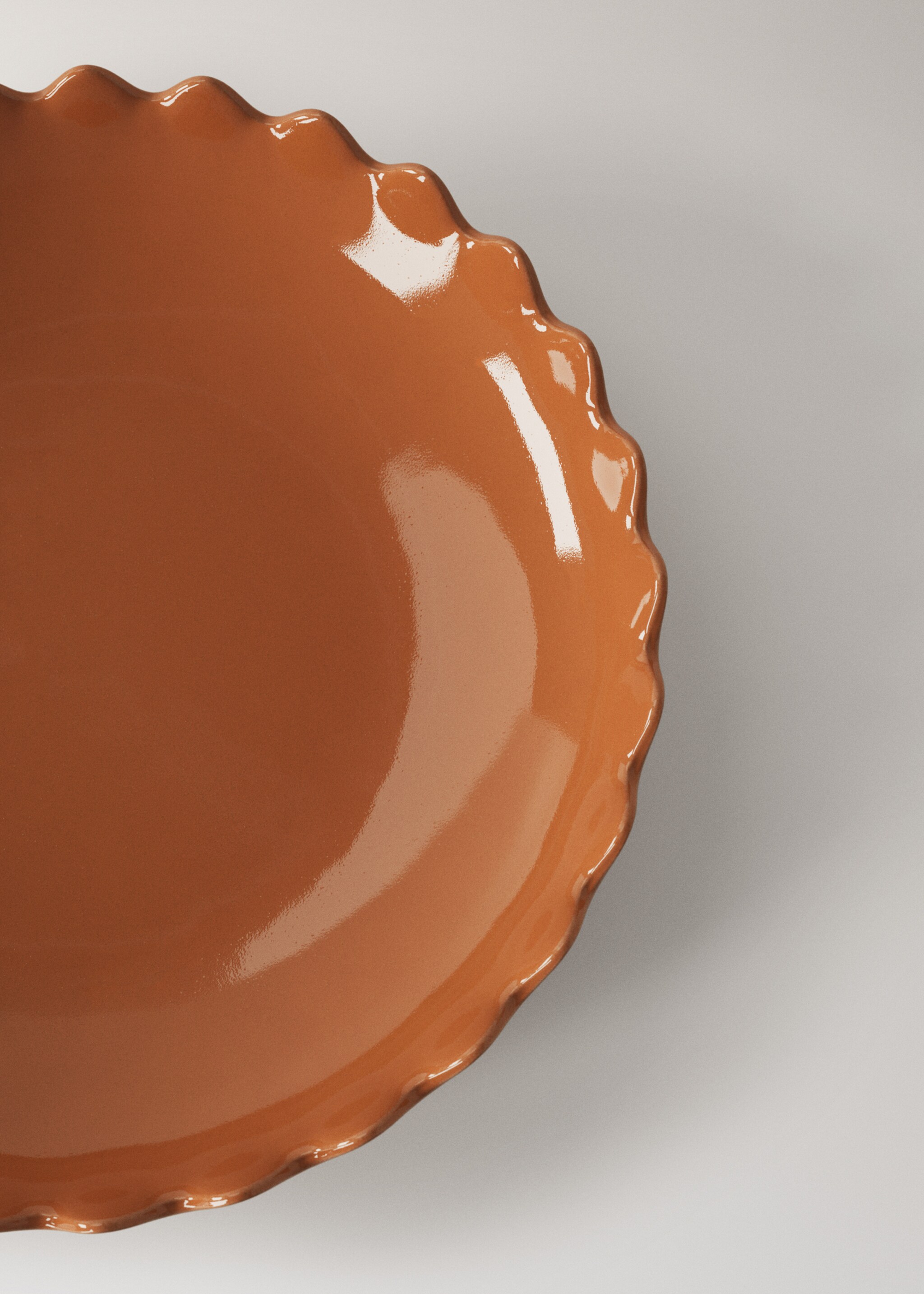 Wave-patterned stoneware bowl in color - Details of the article 1, Burnt Orange. Ref: 27041530-00.