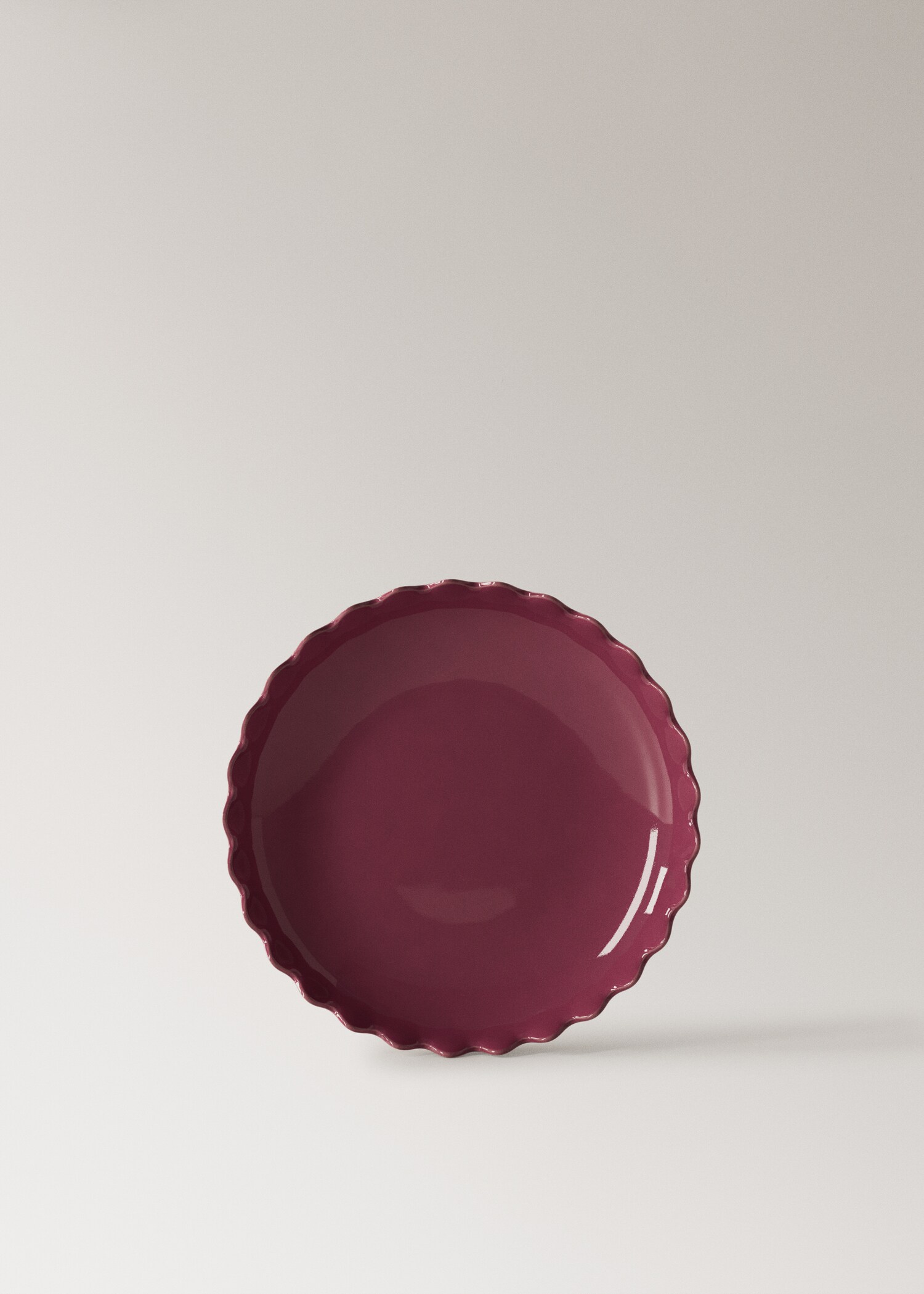 Wave-patterned stoneware bowl in color - Article without model