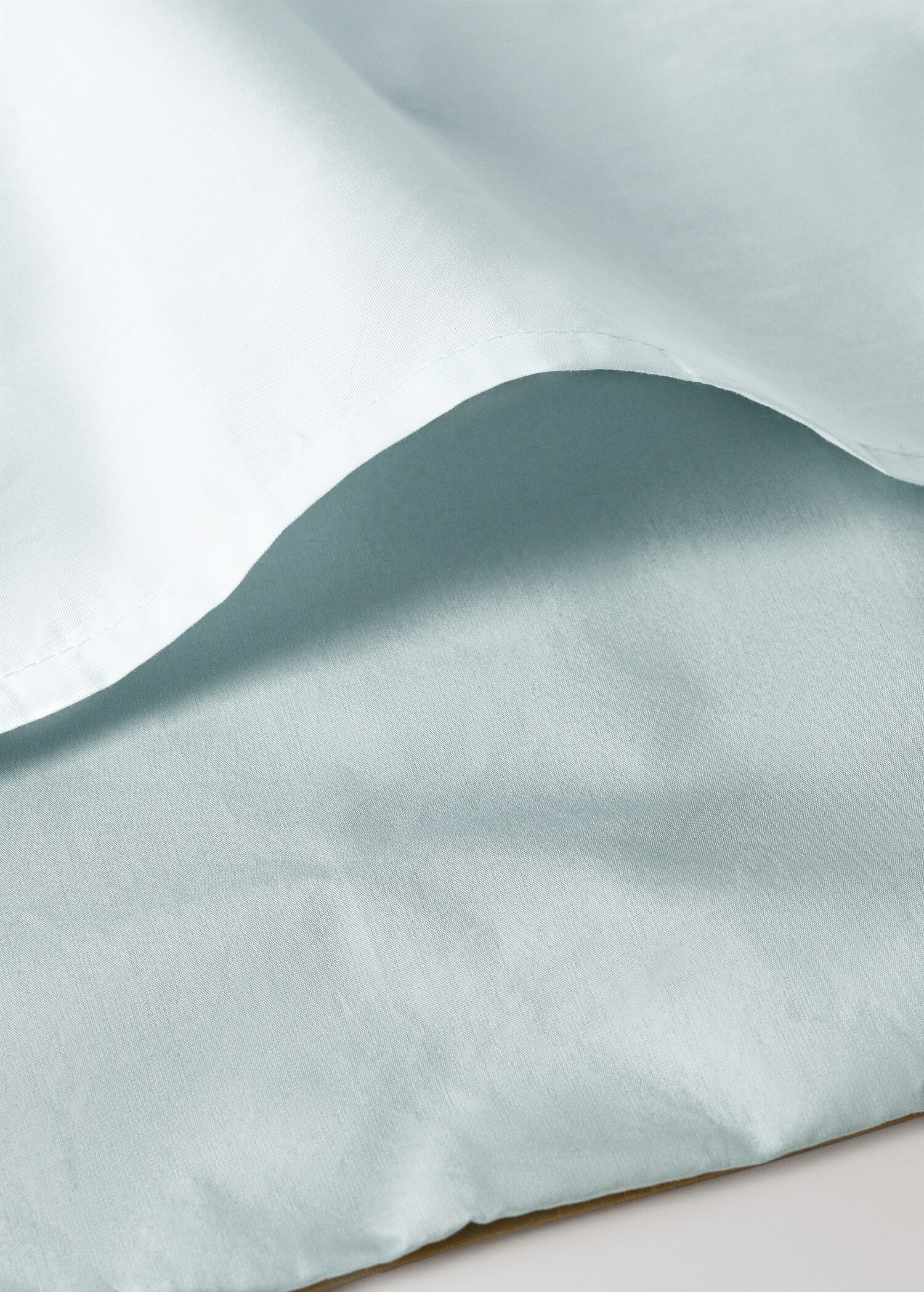 Reversible percale cotton duvet cover with contrasting piping for cot - Details of the article 2