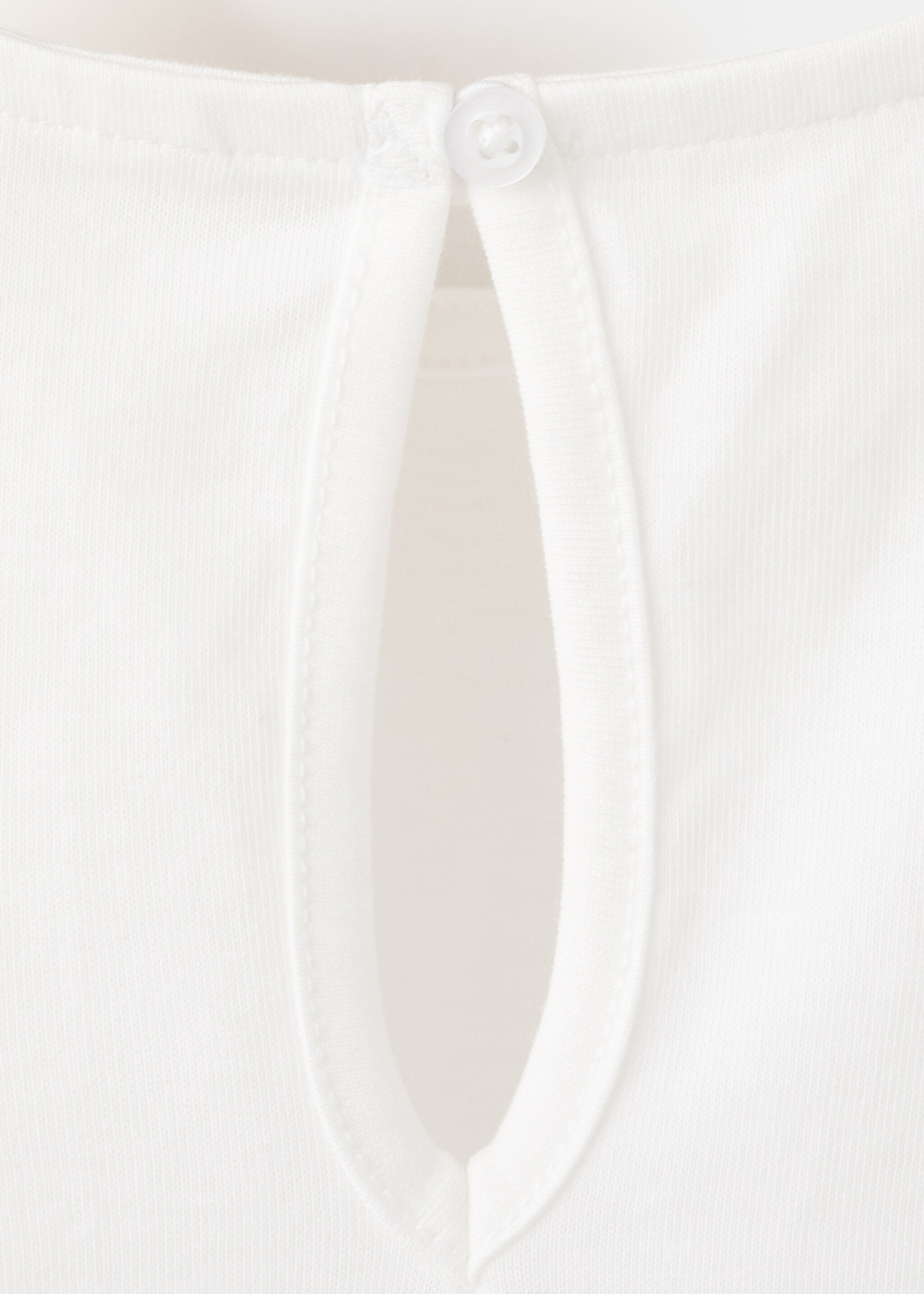 Ruffle top with embroidered details - Details of the article 8, Off White. Ref: 27046339-00.