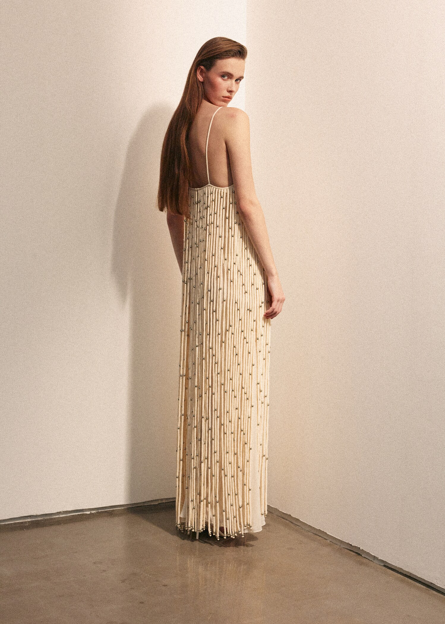 Long dress with sphere tassels - Reverse of the article
