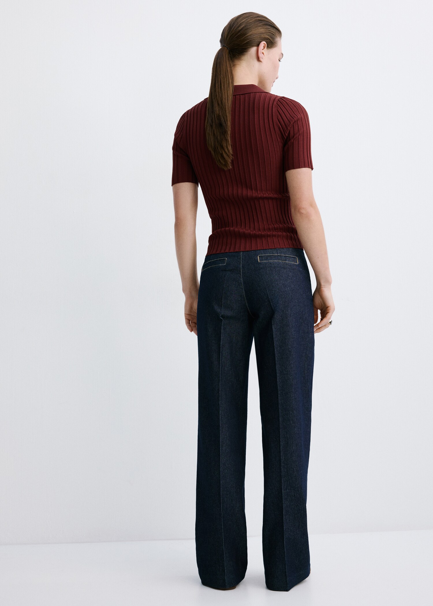Wide-leg jeans with side buttons - Reverse of the article