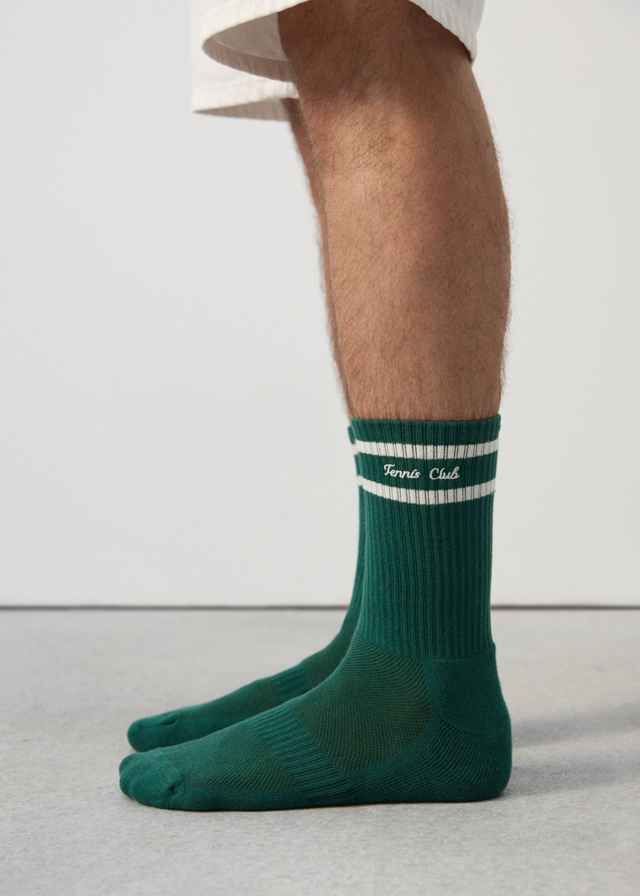 Striped socks with embroidered text - Details of the article 9, Dark Green. Ref: 27047792-00.