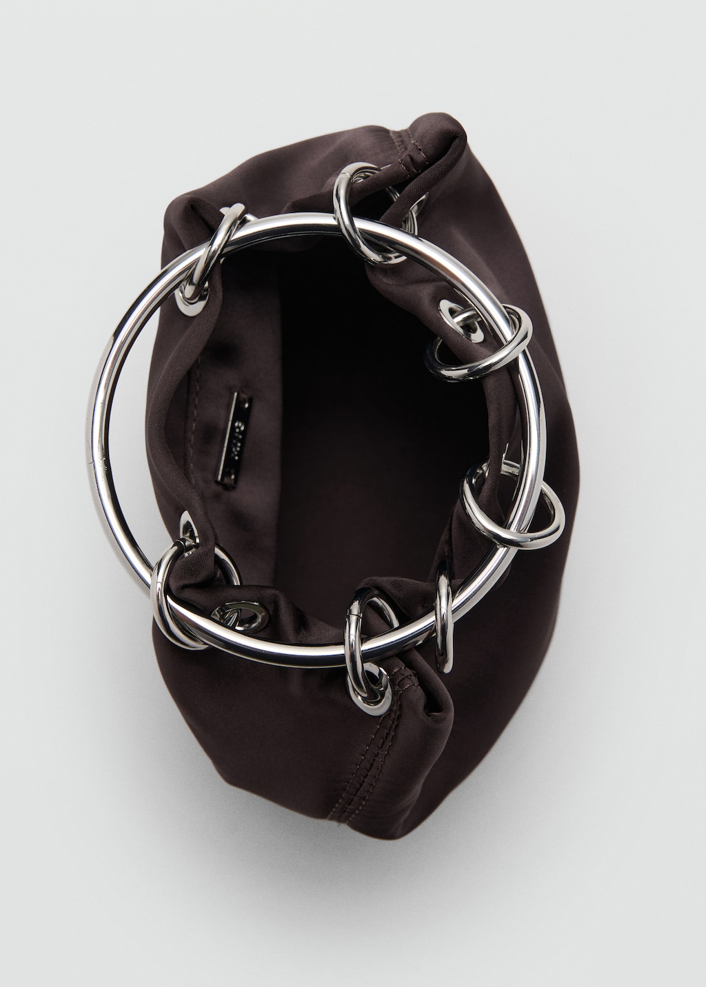 Handbag with metal handle