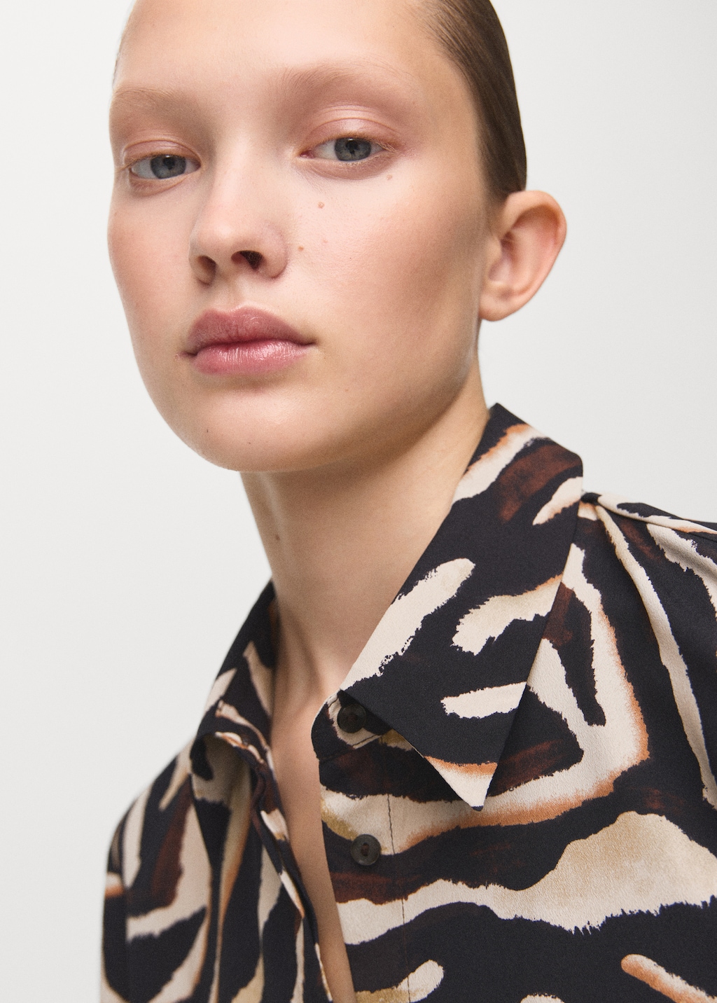 Straight-cut animal-print blouse