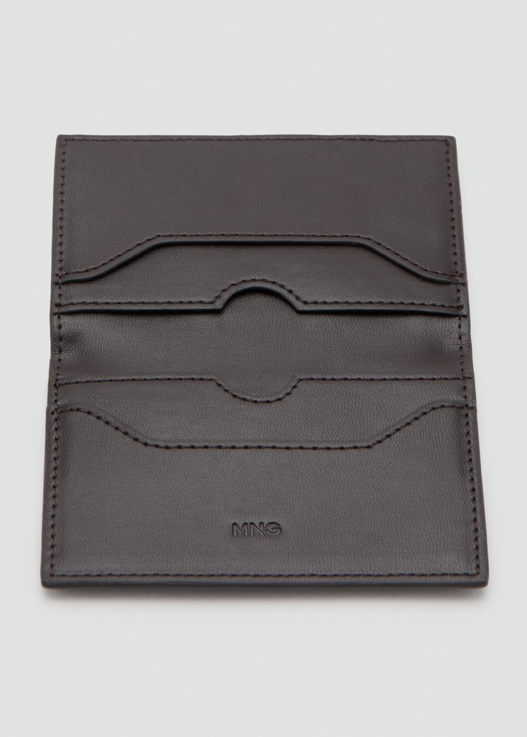 Suede cardholder with studs - Details of the article 1, Chocolate. Ref: 27051299-00.