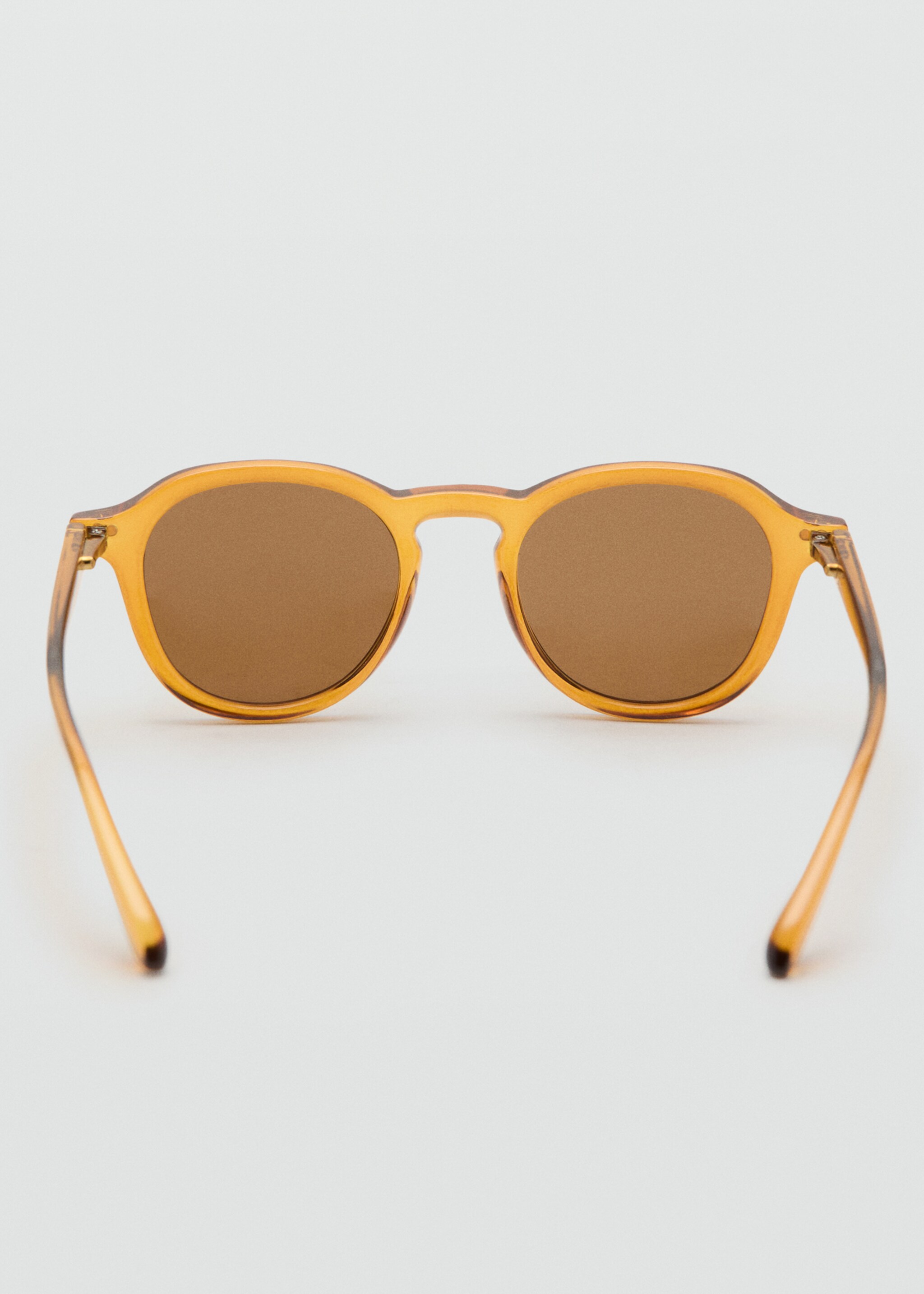 Semi-transparent frame sunglasses - Details of the article 1, Ochre. Ref: 27051302-00.