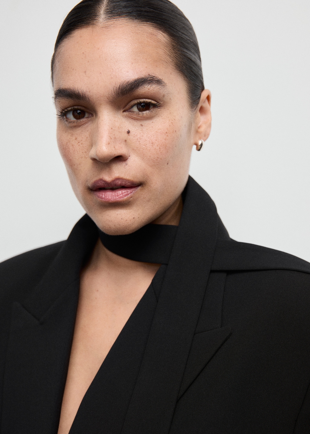 Suit jacket with scarf