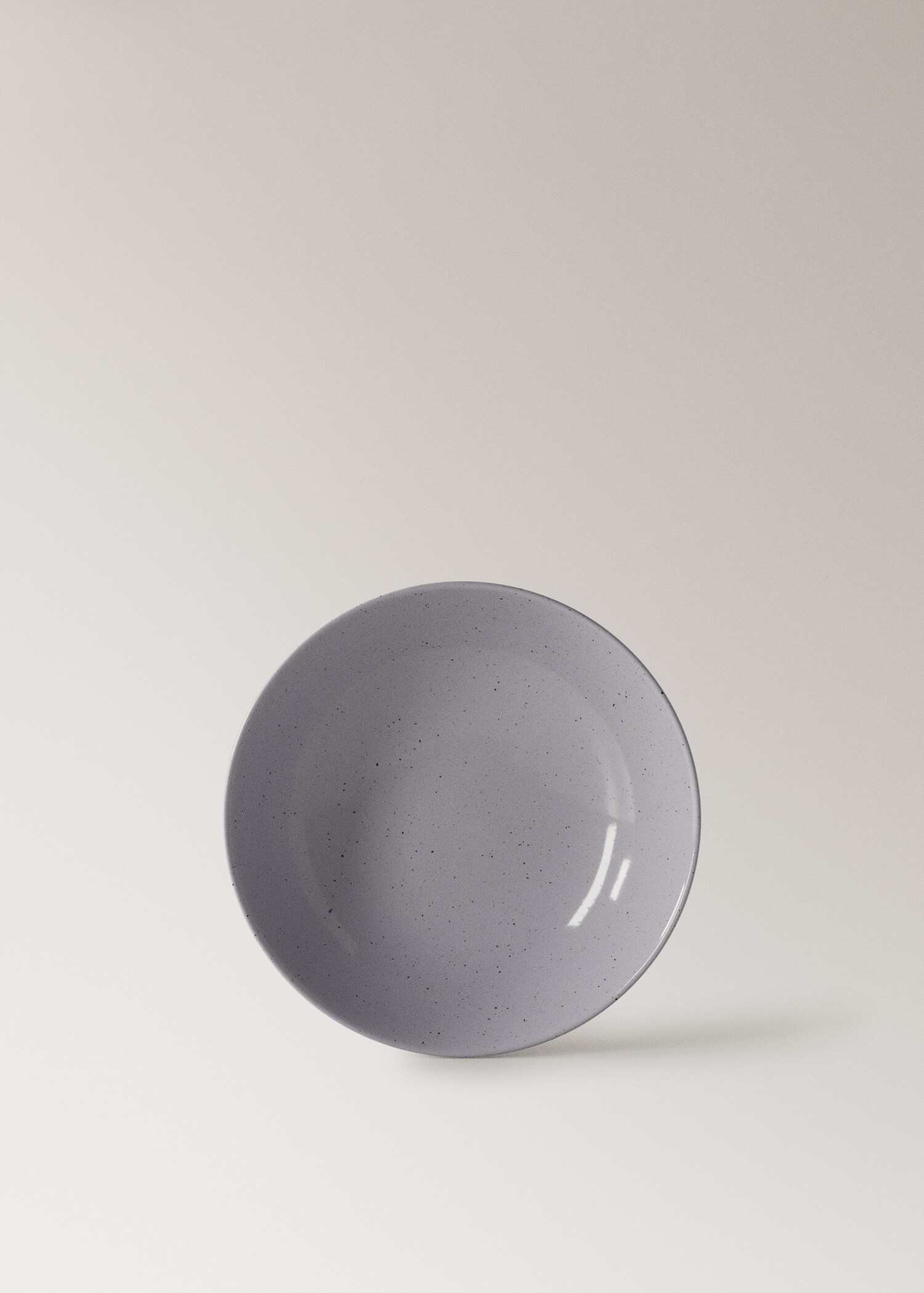 Deep stoneware plate with spots - Article without model