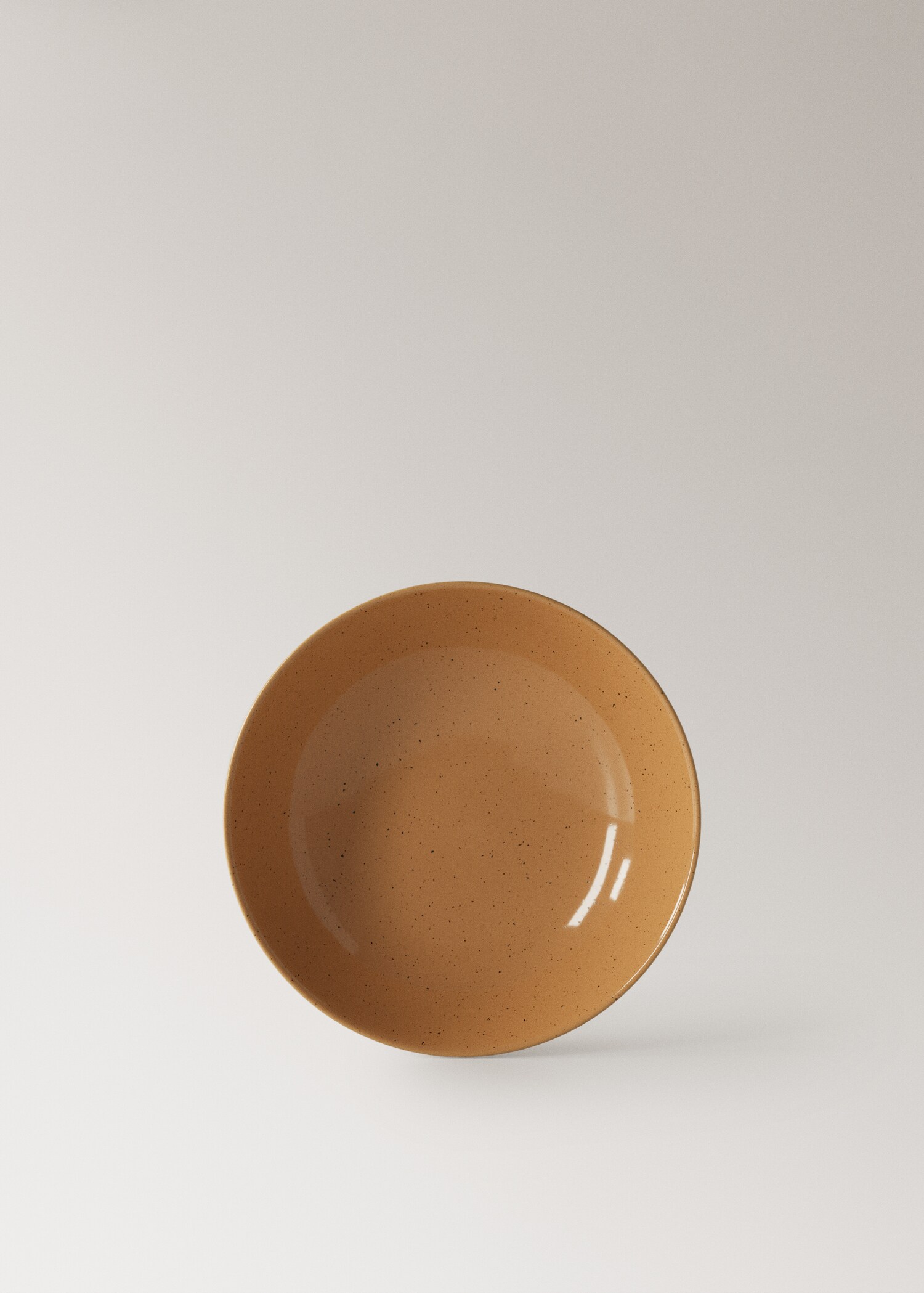 Deep stoneware plate with spots - Article without model