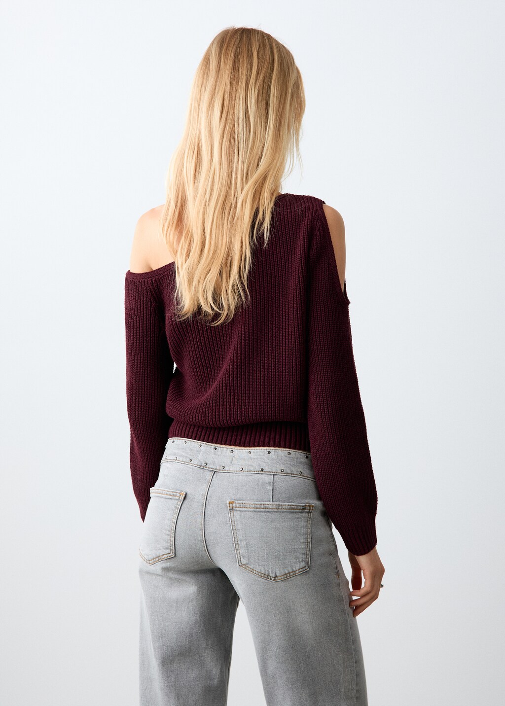Asymmetrical sweater with shoulder opening