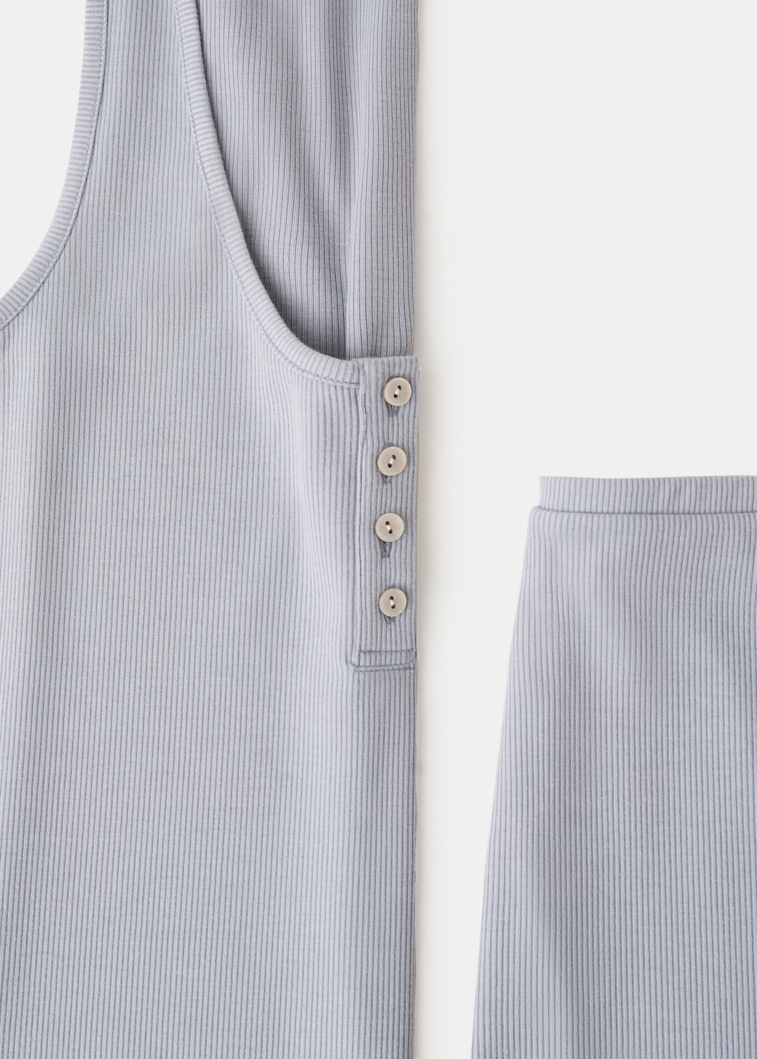Sleeveless top with round neckline and button detail - Details of the article 0