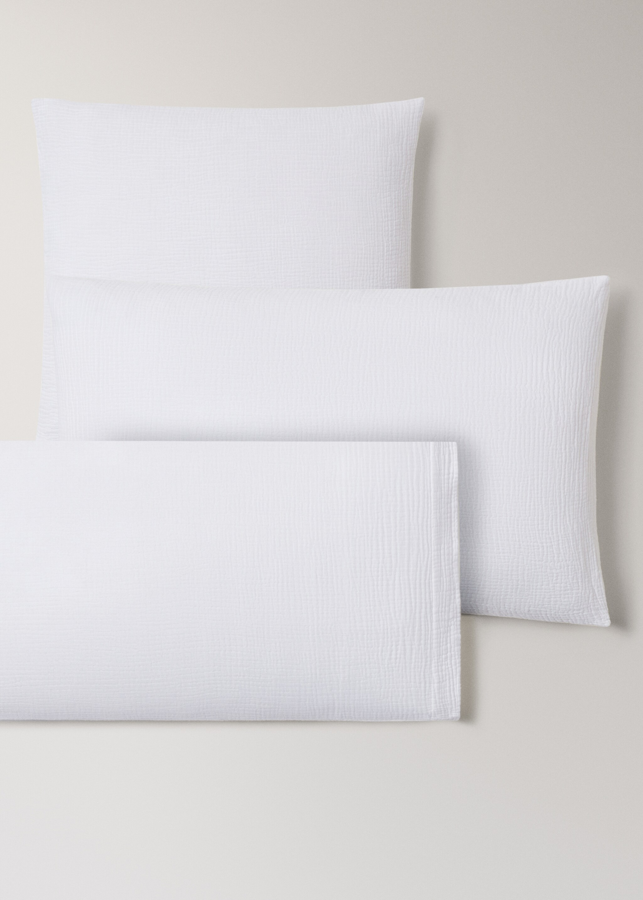 Kopfkissenbezug aus Baumwoll-Musselin 45 x 110 cm - Detail des Artikels 3, Cremeweiß. Ref: 27053733-00.