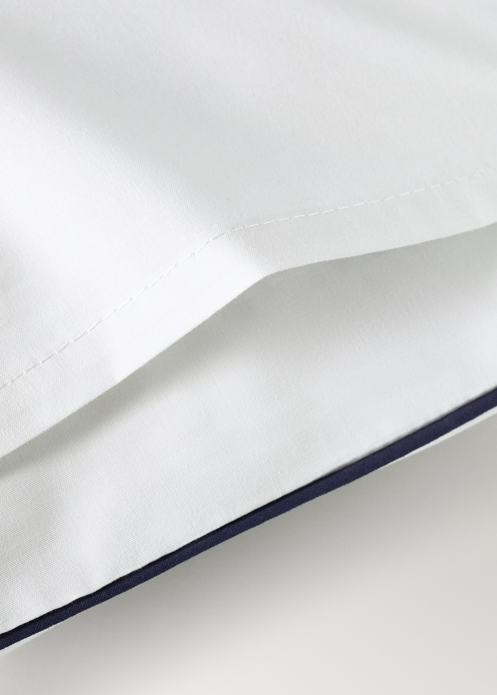 Reversible cotton percale cot pillowcase with contrast piping 30x50 cm - Details of the article 2, Sky Blue. Ref: 27054067-00.