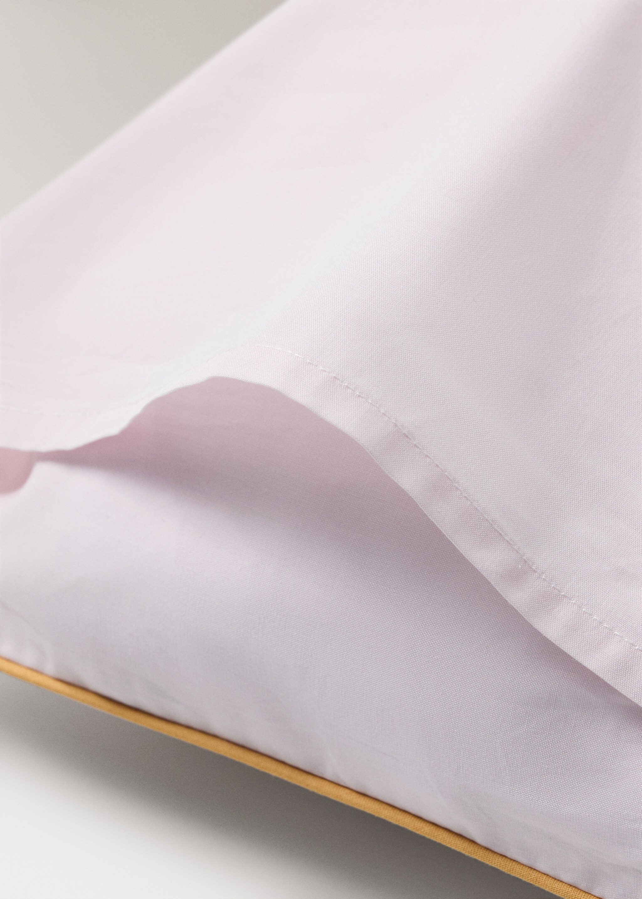 Reversible cotton percale cot pillowcase with contrast piping 30x50 cm - Details of the article 1, Light/Pastel Purple. Ref: 27054067-00.