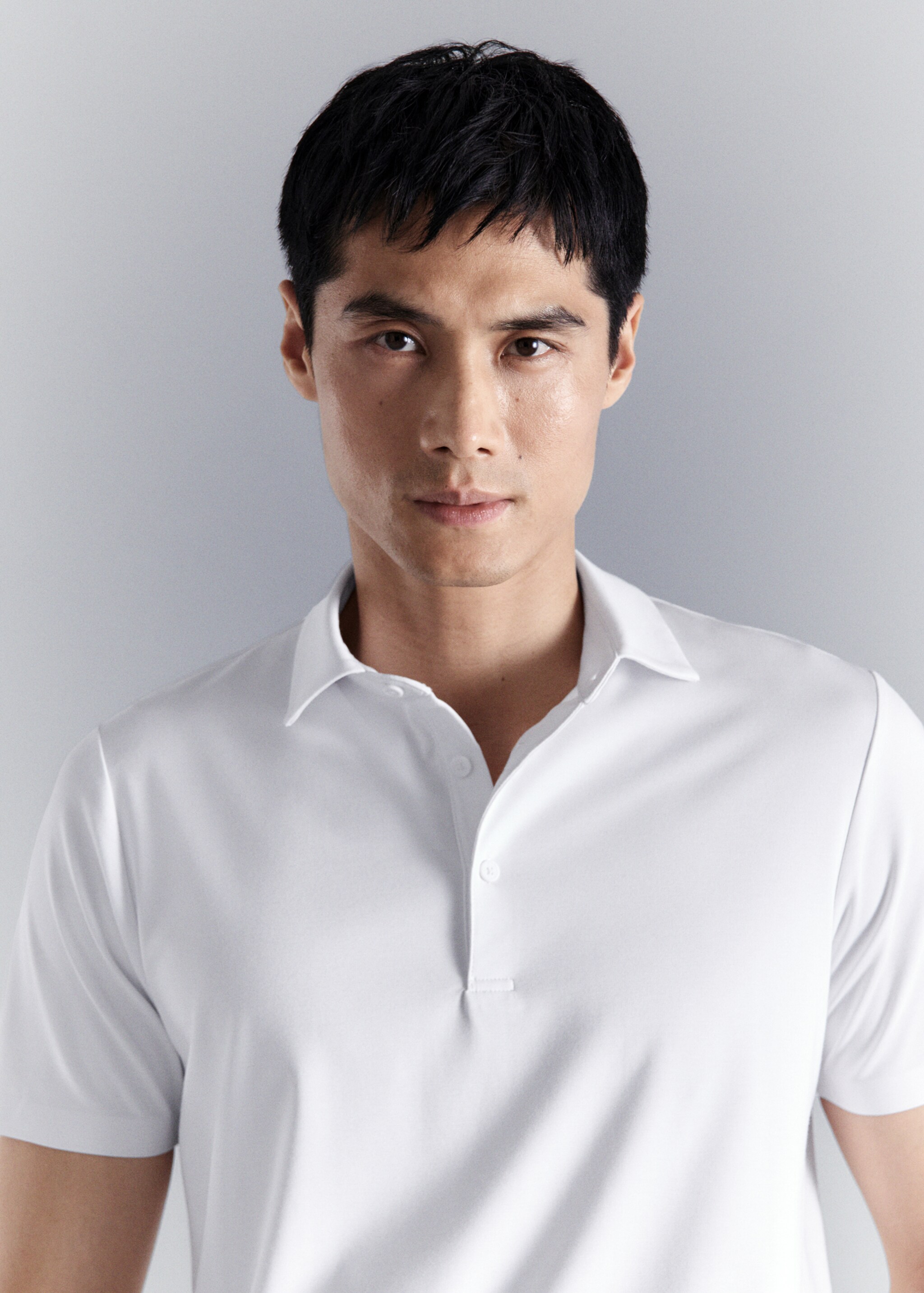 Polo comfort extensible à boutons - Détail de l'article 1, Blanc. Ref: 27054425-00.