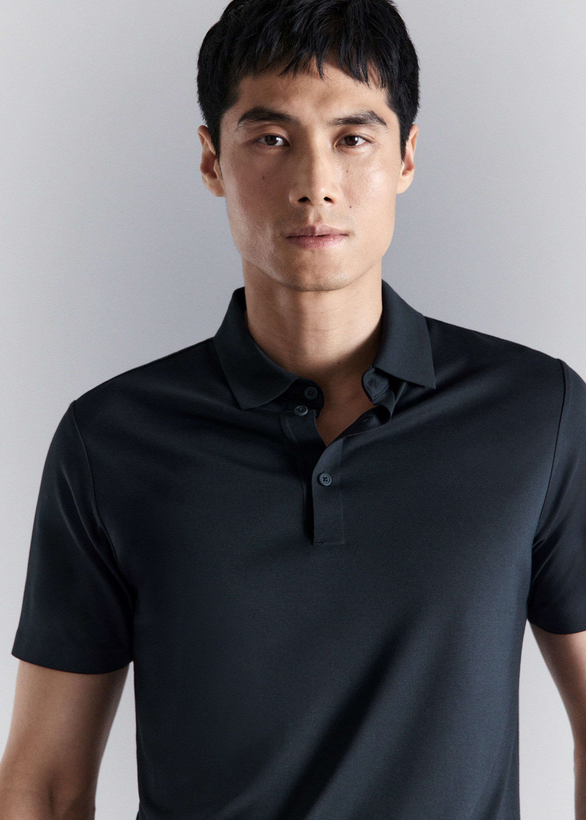 Polo comfort extensible à boutons - Détail de l'article 1, Bleu marine. Ref: 27054425-00.