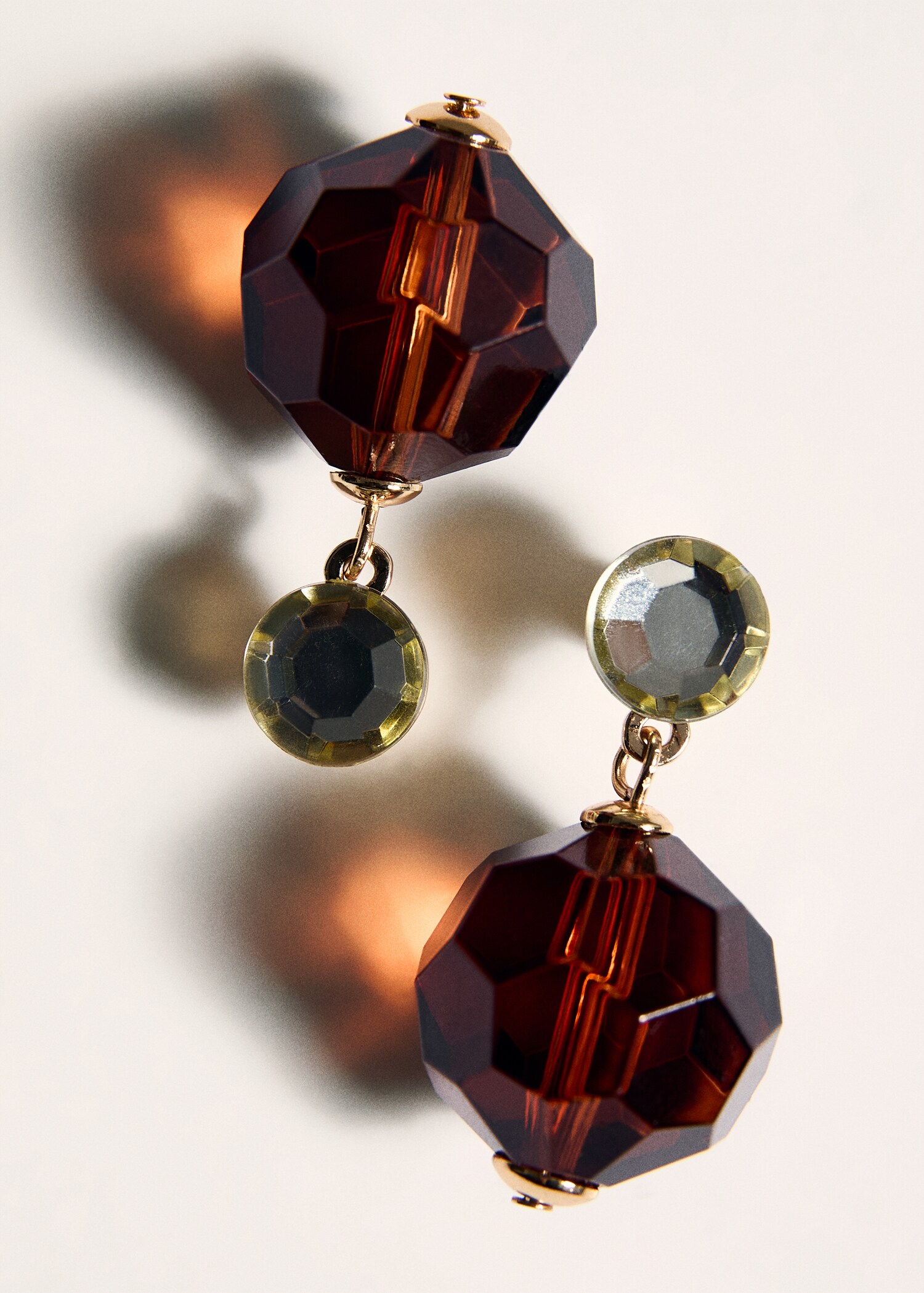 Brincos às bolas combinados - Pormenor do artigo 5