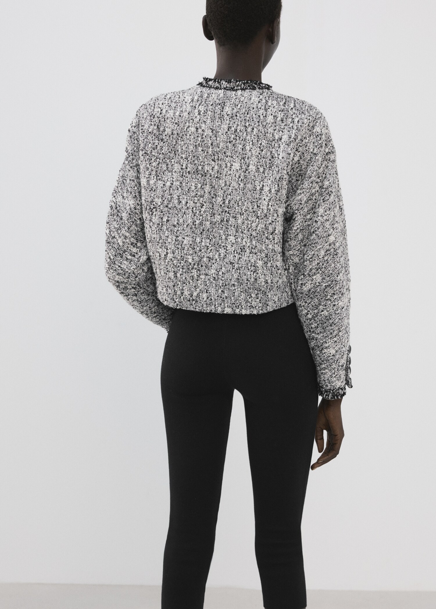 Tweed jacket with frayed ends - Reverse of the article