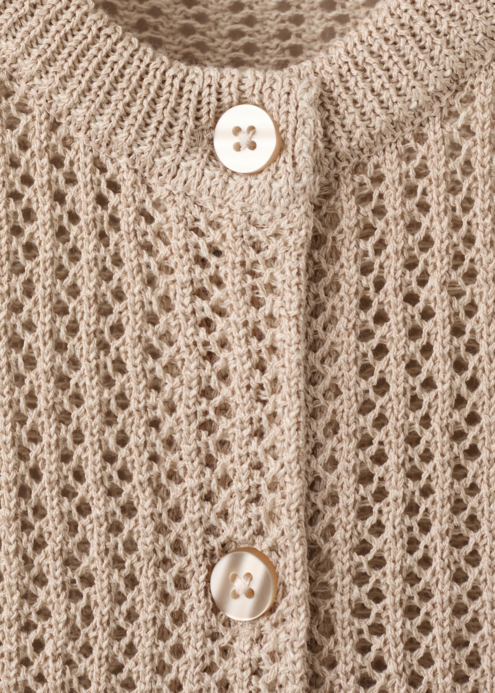 Short-sleeved openwork knitted cardigan - Details of the article 8, Sand. Ref: 27055824-00.