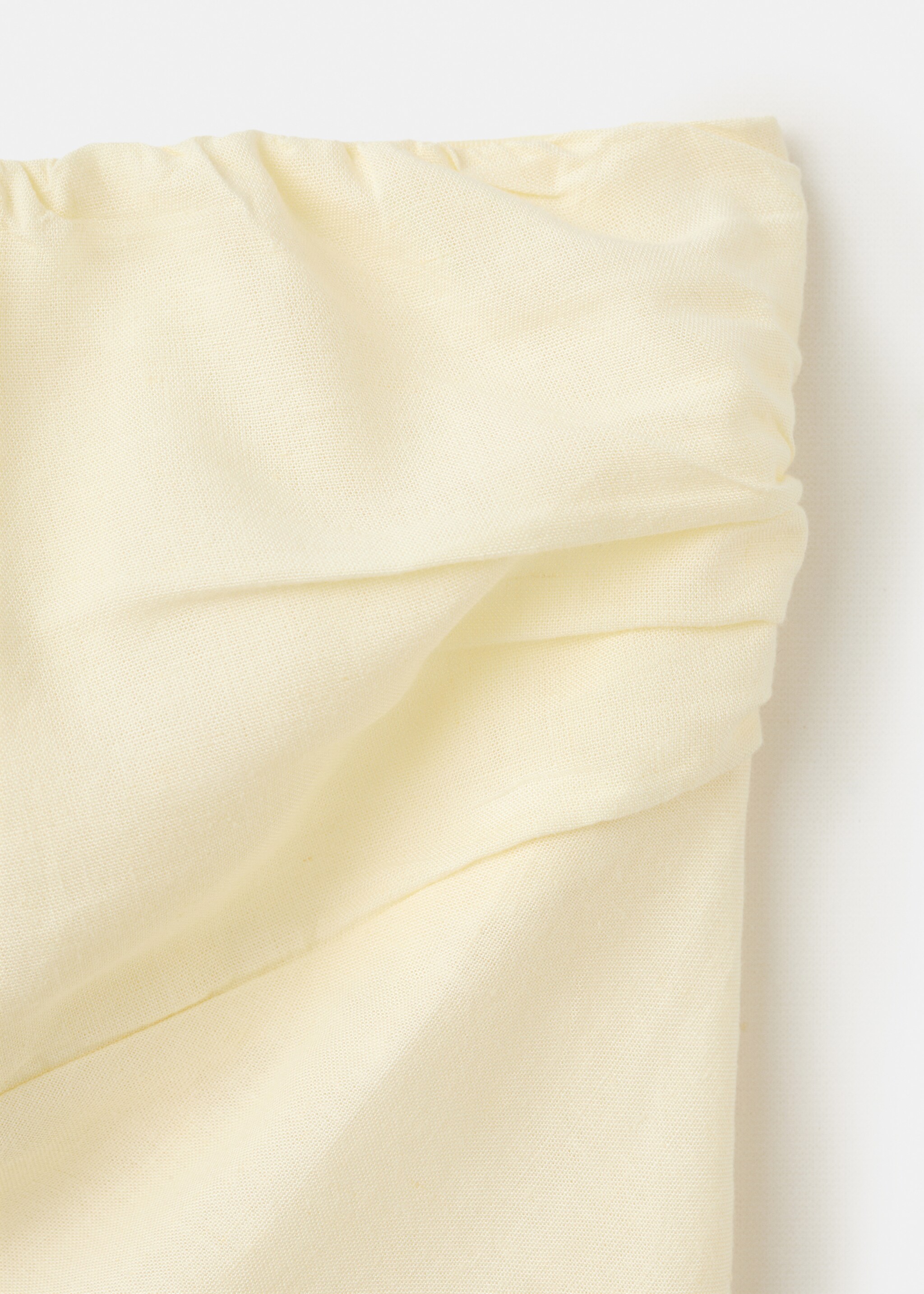 Asymmetric bandeau top - Details of the article 8, Pastel Yellow. Ref: 27055971-00.