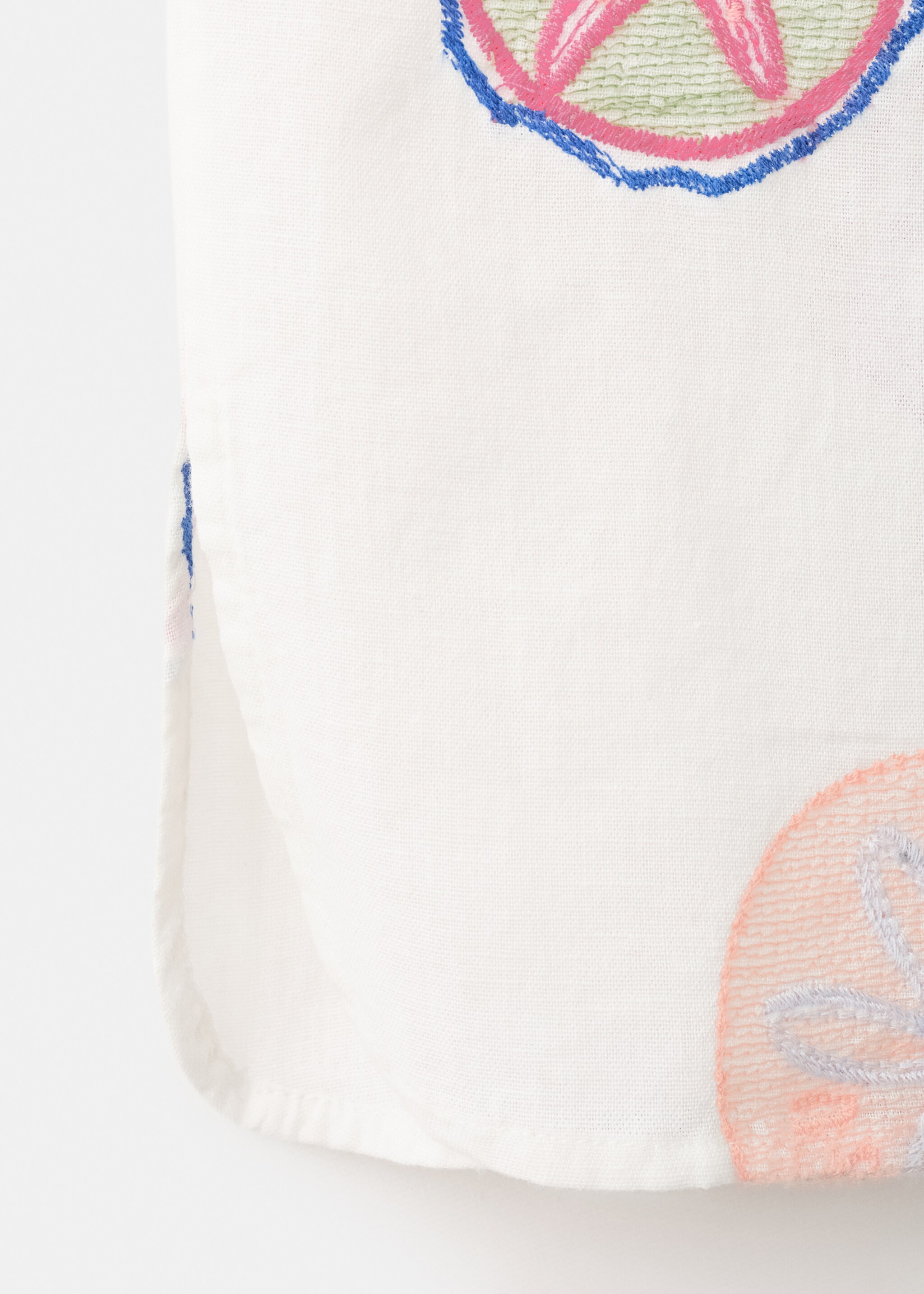 Long pants with embroidered details - Details of the article 0, White. Ref: 27056732-00.