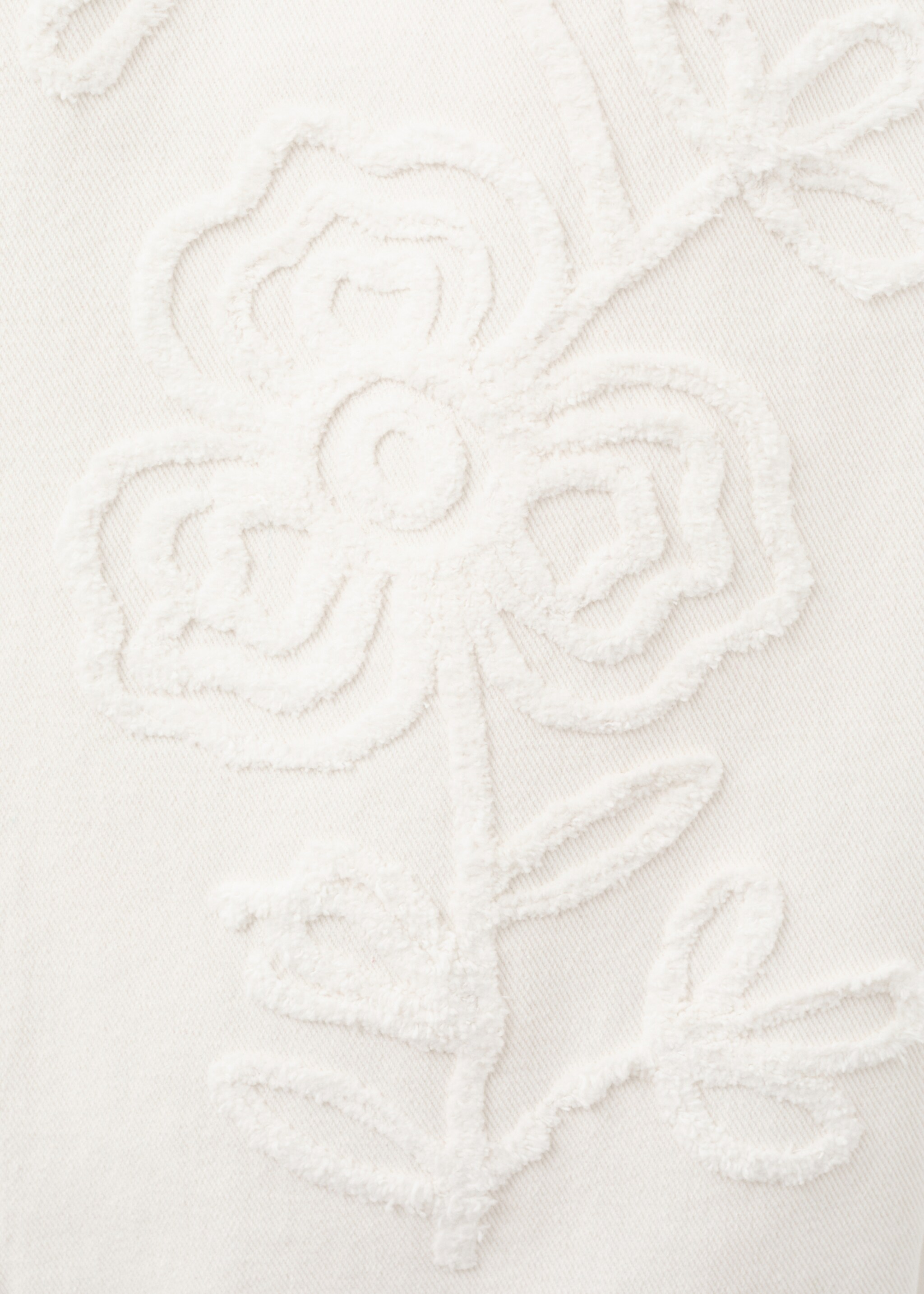 Jean large avec broderie à fleurs - Détail de l'article 8, Blanc cassé. Ref: 27057151-00.
