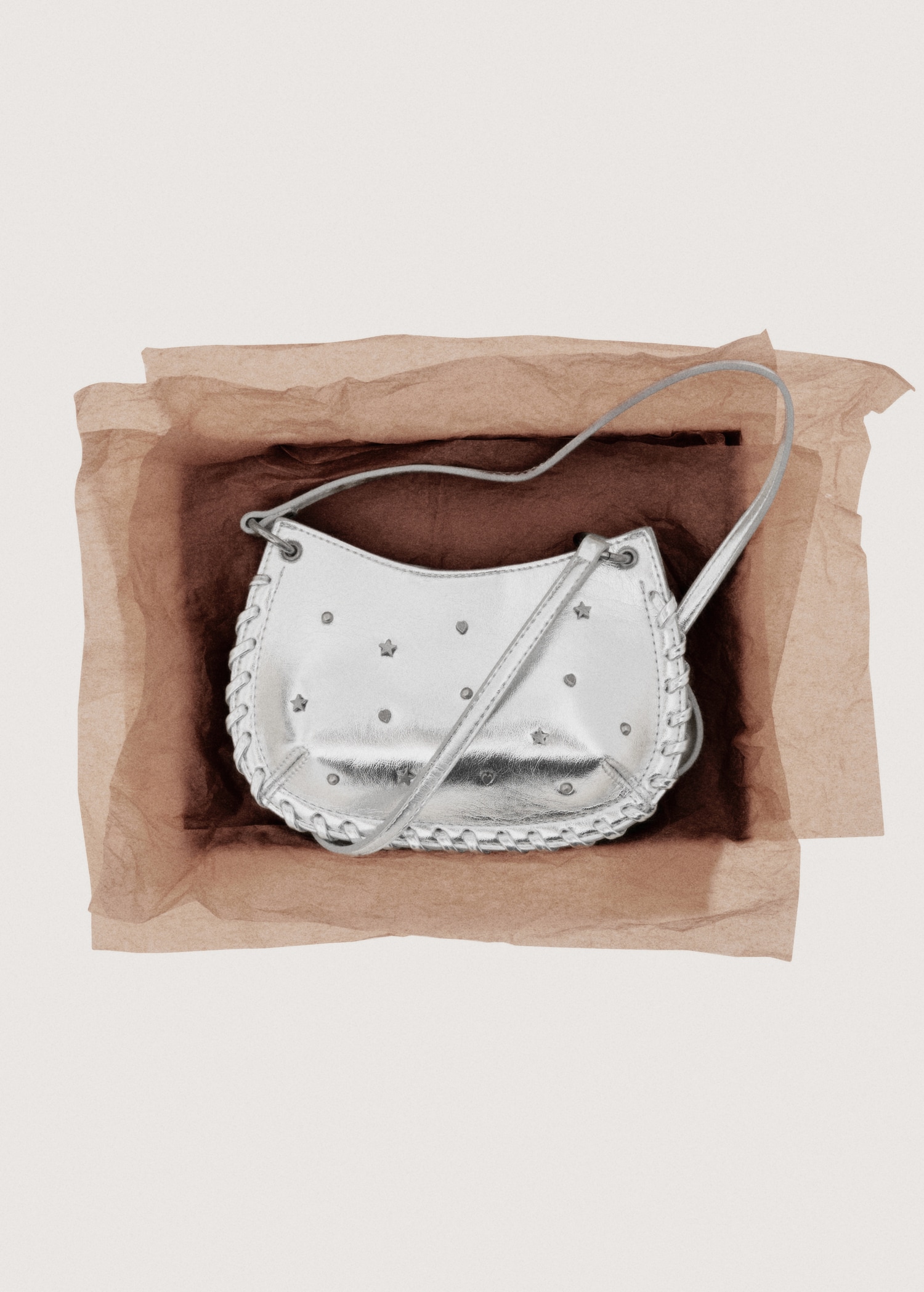 Minitas met stervormige studs - Detail van het artikel 7